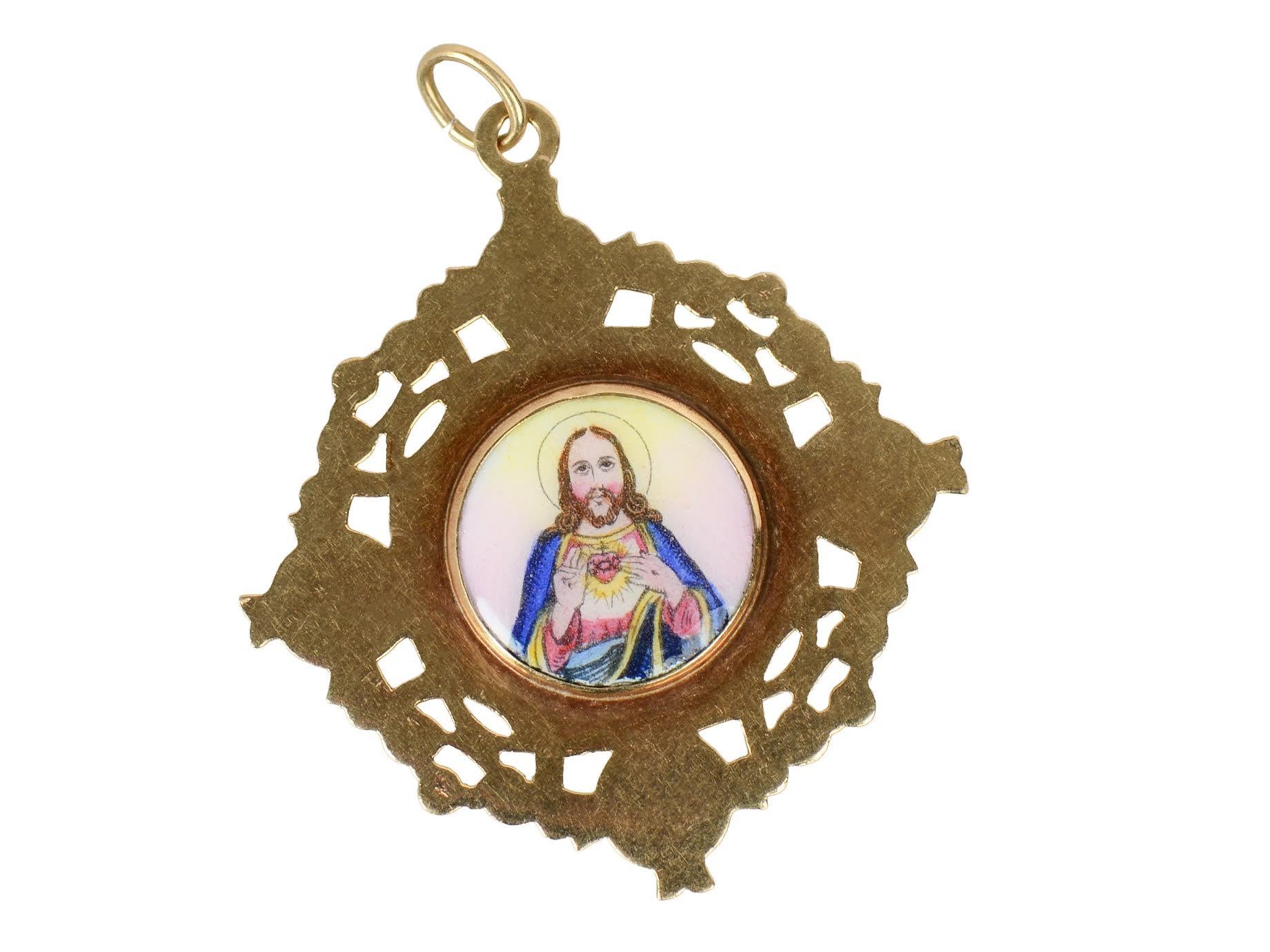 Retro Gold and Enamel Religious Medal of Jesus and Mary (#2077dbs)
An intricate religious medal in enamel and 10 kt Gold shows Mary holding baby Jesus painted on one side and Jesus on the reverse. Mary wears a golden crown. There are two angels at