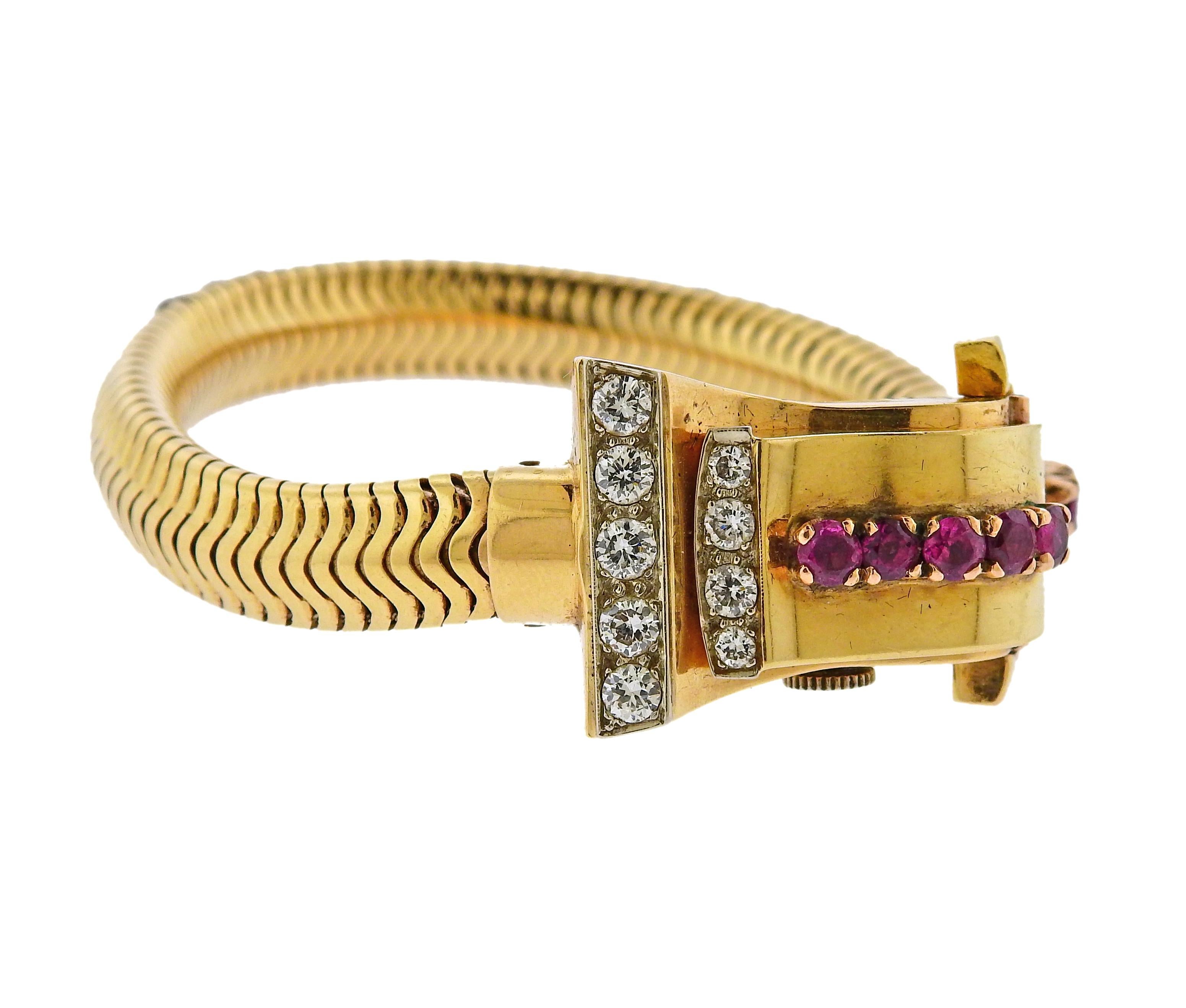 Retro circa 1940s iconic design watch bracelet, adorned with rubies, and approx. 1.12ctw in diamonds. The bracelet is 7.25