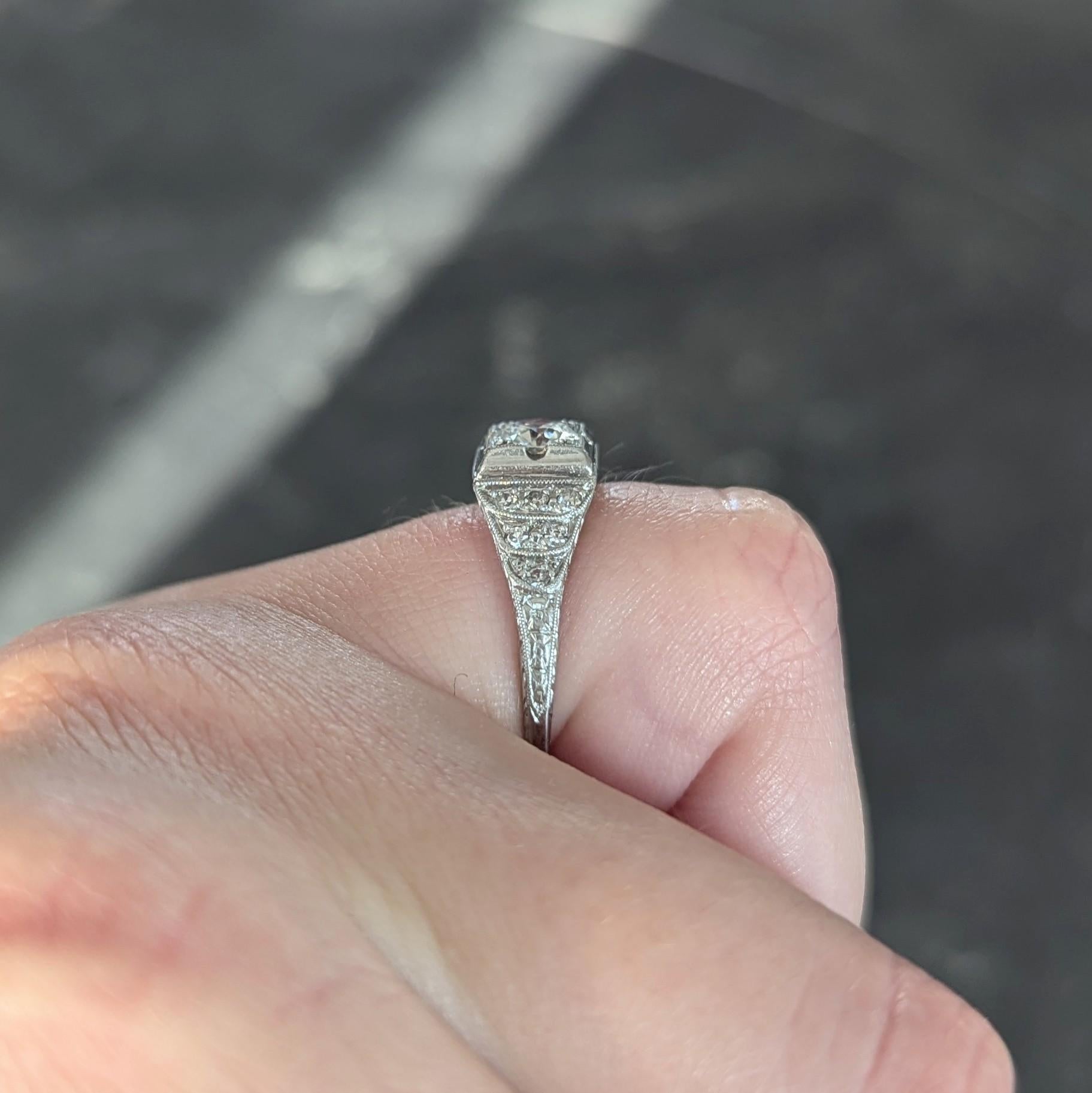Retro 1945 0.70 CTW Diamond Platinum Vintage Stepped Engagement Ring For Sale 5