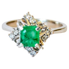 0.24 carat Diamond and 0.75 carat Emerald Gold Ring