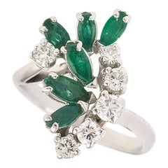 Retro 1950s 0.60 Carat Emerald 0.40 Diamonds Carat 18 Karat White Gold Ring