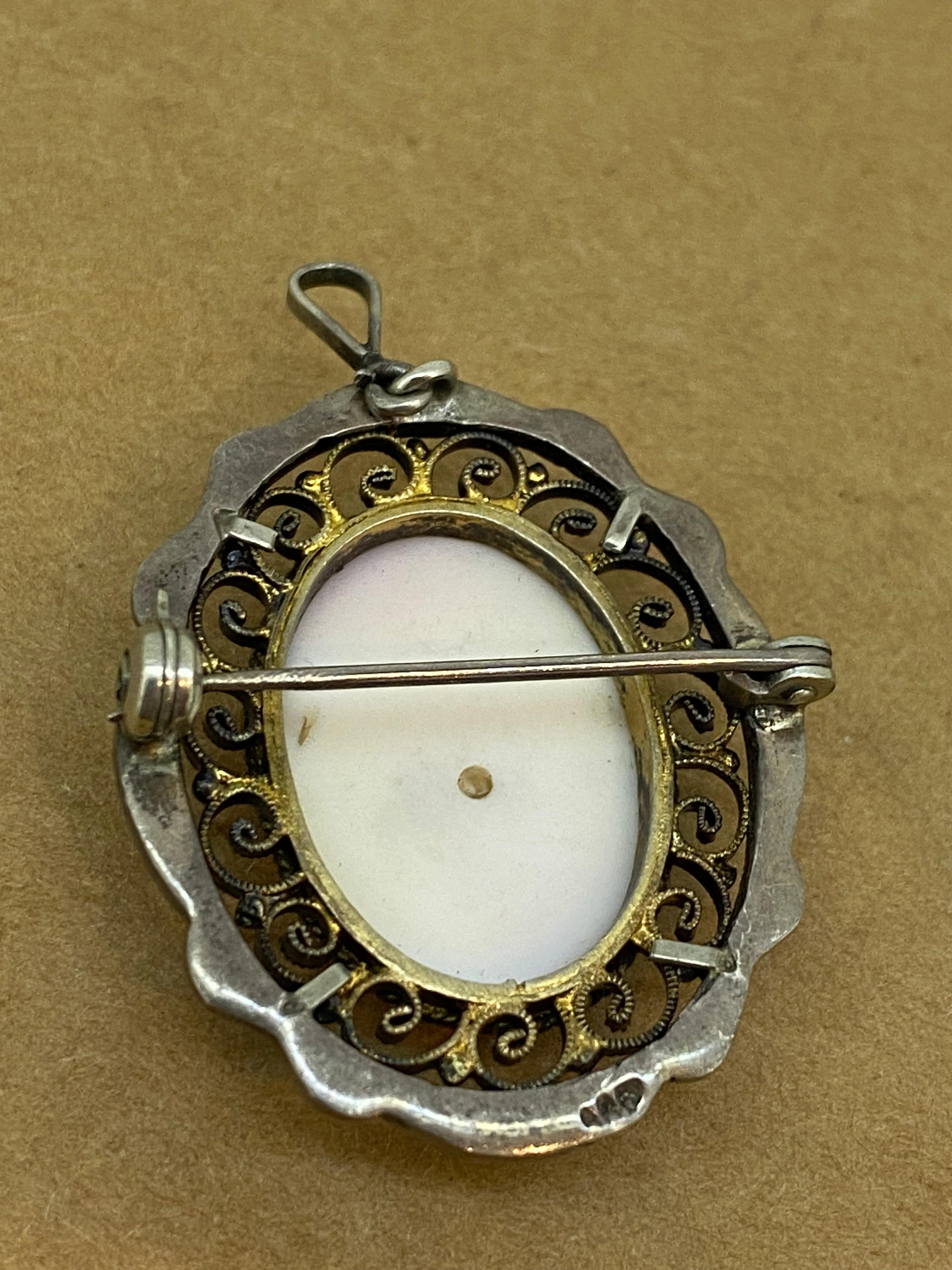 Oval Cut Retro 1950's Finely Carved Pinkish White Coral Silver Cameo Brooch / Pendant For Sale