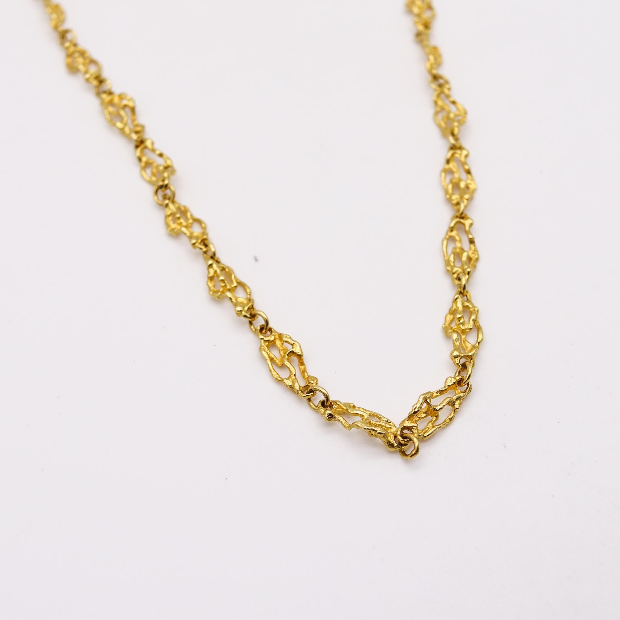 A chain with organic links.

Beautiful retro chain with organic modernist links created in the northern region of Europe, most probably in Switzerland or Germany, back in the 1970. It was crafted in solid yellow gold of 18 karats and fitted with a