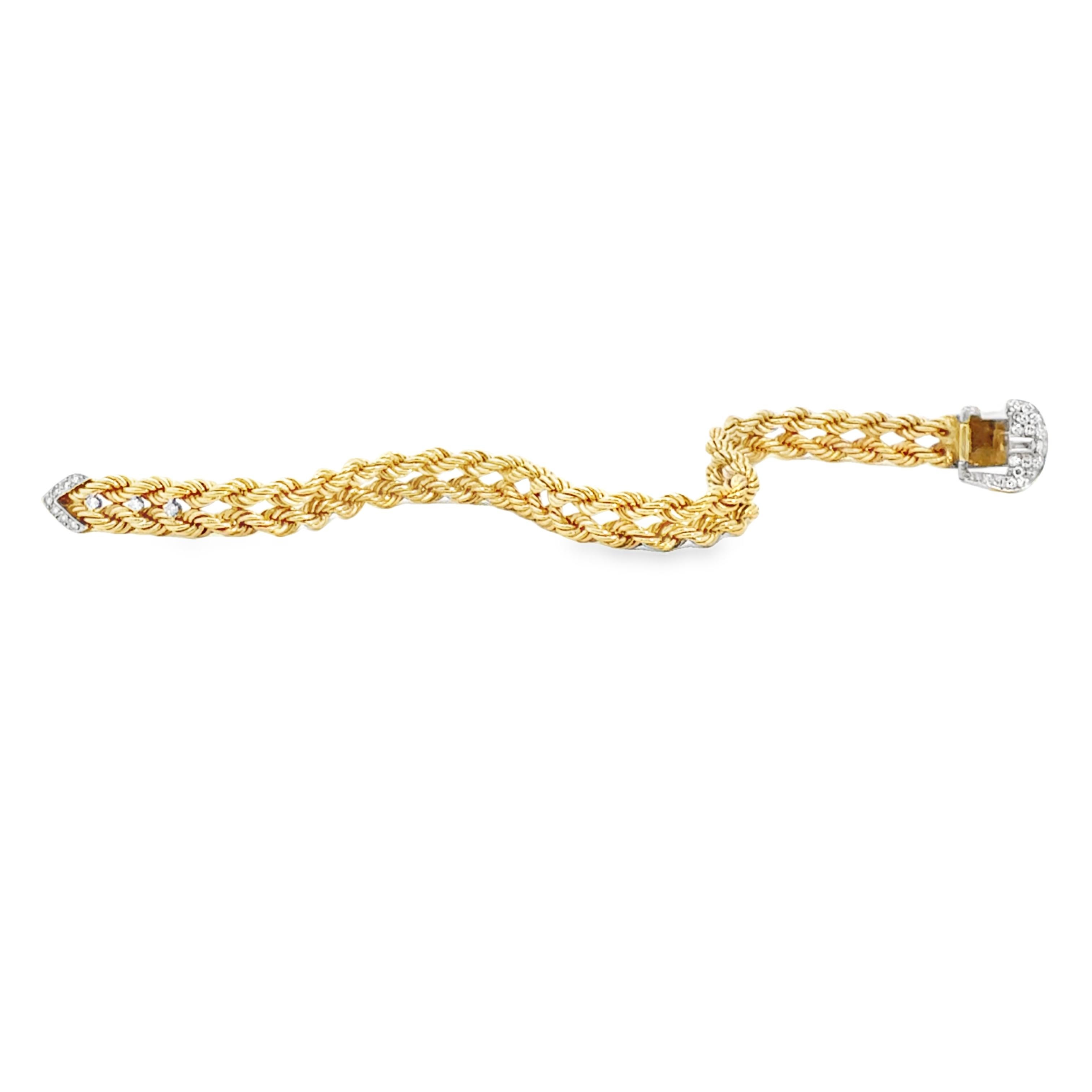 This retro 1970s 14K gold diamond buckle bracelet by Hammerman Brothers is a striking statement of timeless luxury and craftsmanship. Designed in an iconic belt motif, the bracelet is expertly woven in rich yellow gold, weighing a substantial 32.9