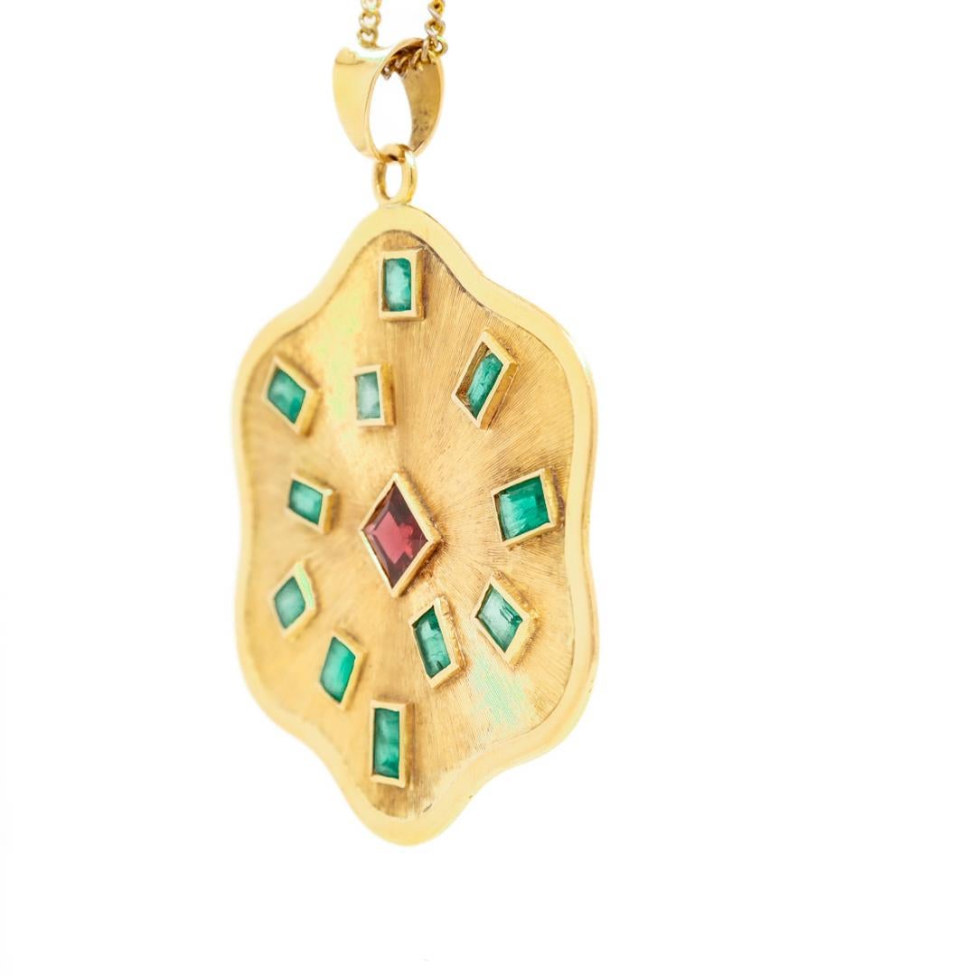 Women's Retro 1970s Modern 18k Gold, Emeralds, and Garnet Pendant for a Necklace For Sale