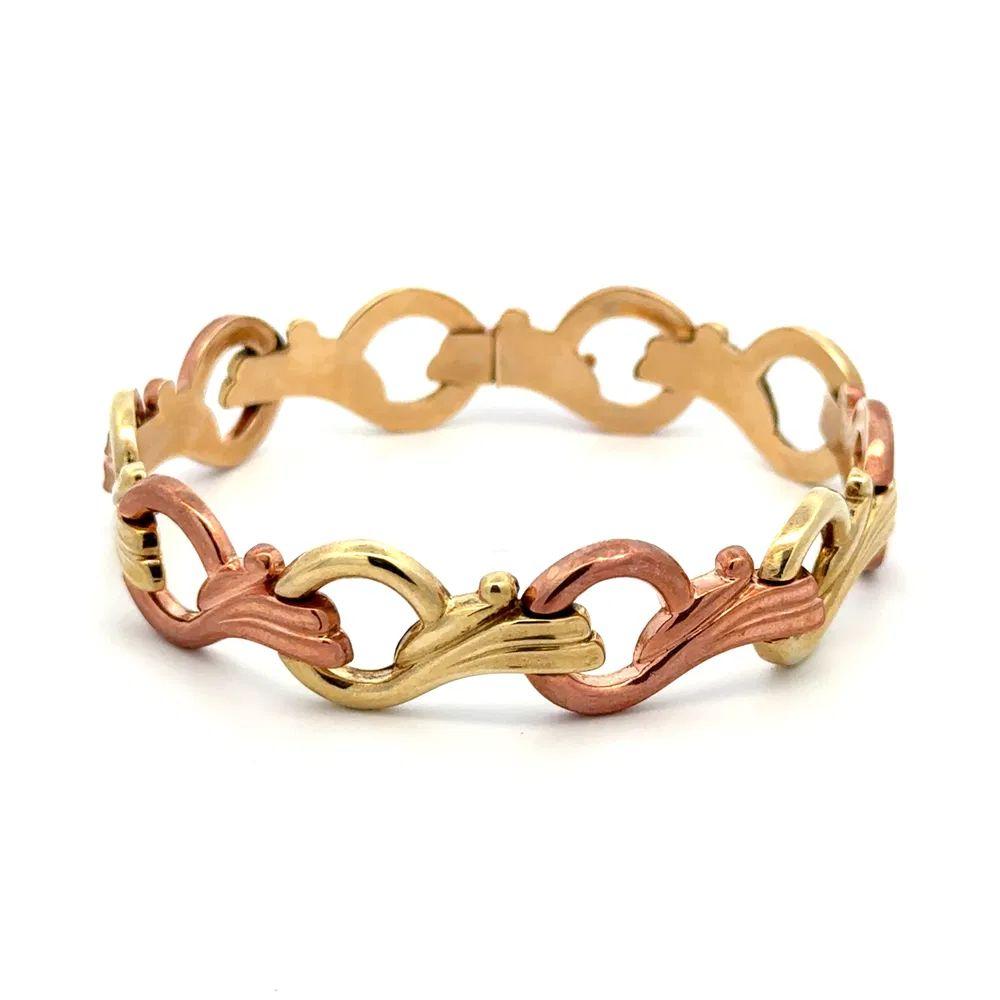 Magnifique ! Bracelet Vintage rétro à maillons stylisés en or bicolore finement détaillés. Fabriqué à la main en or vert et rose 14 carats. Le bracelet mesure environ 7