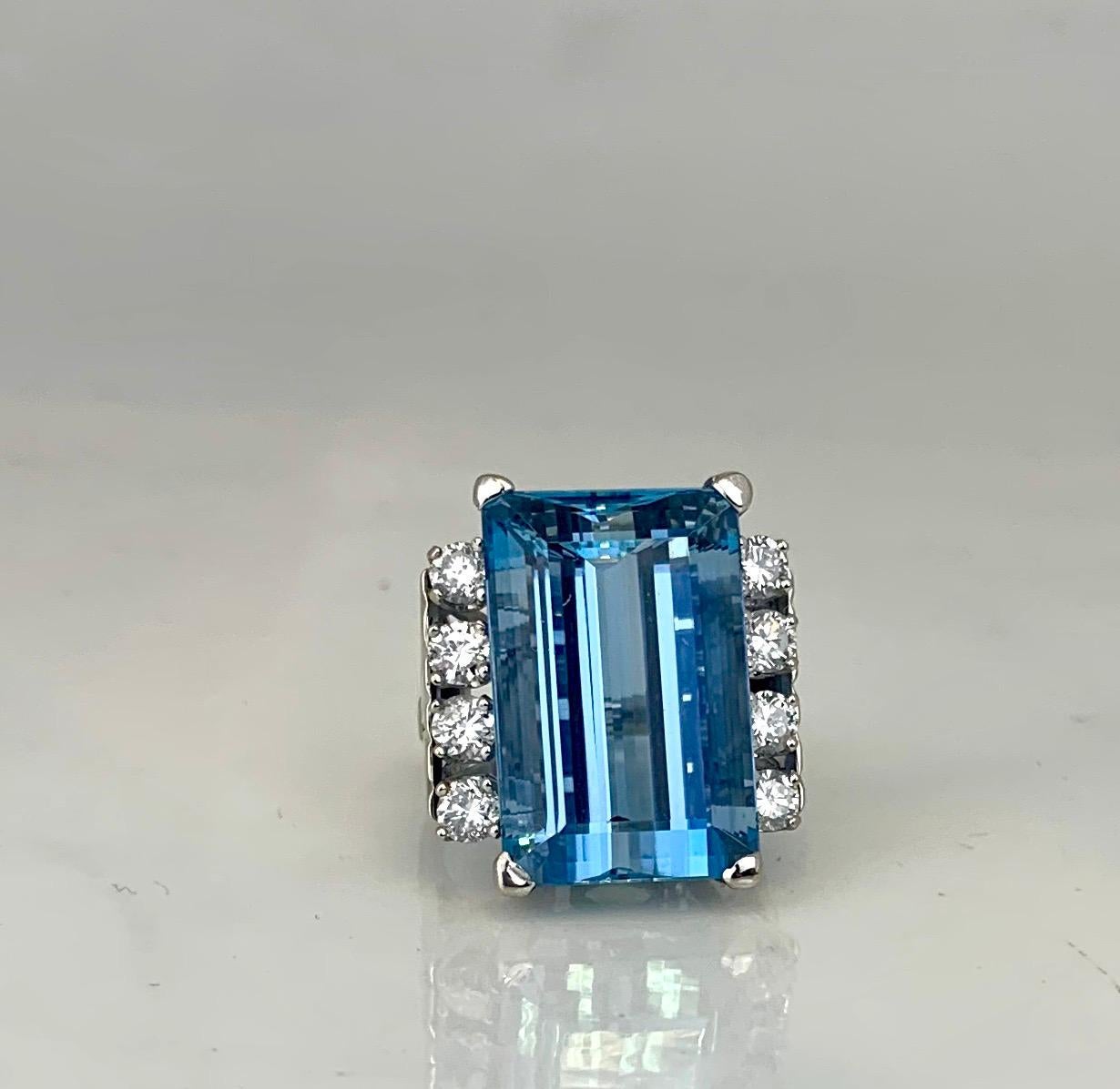This aquamarine and diamond ring has a perfect balance of the cool slate blue Aquamarine and white diamonds that shows why this ring is superior to many others.  The center stone measures 20 x 12.73 x10.84mm and carries an idealistic Aquamarine Blue