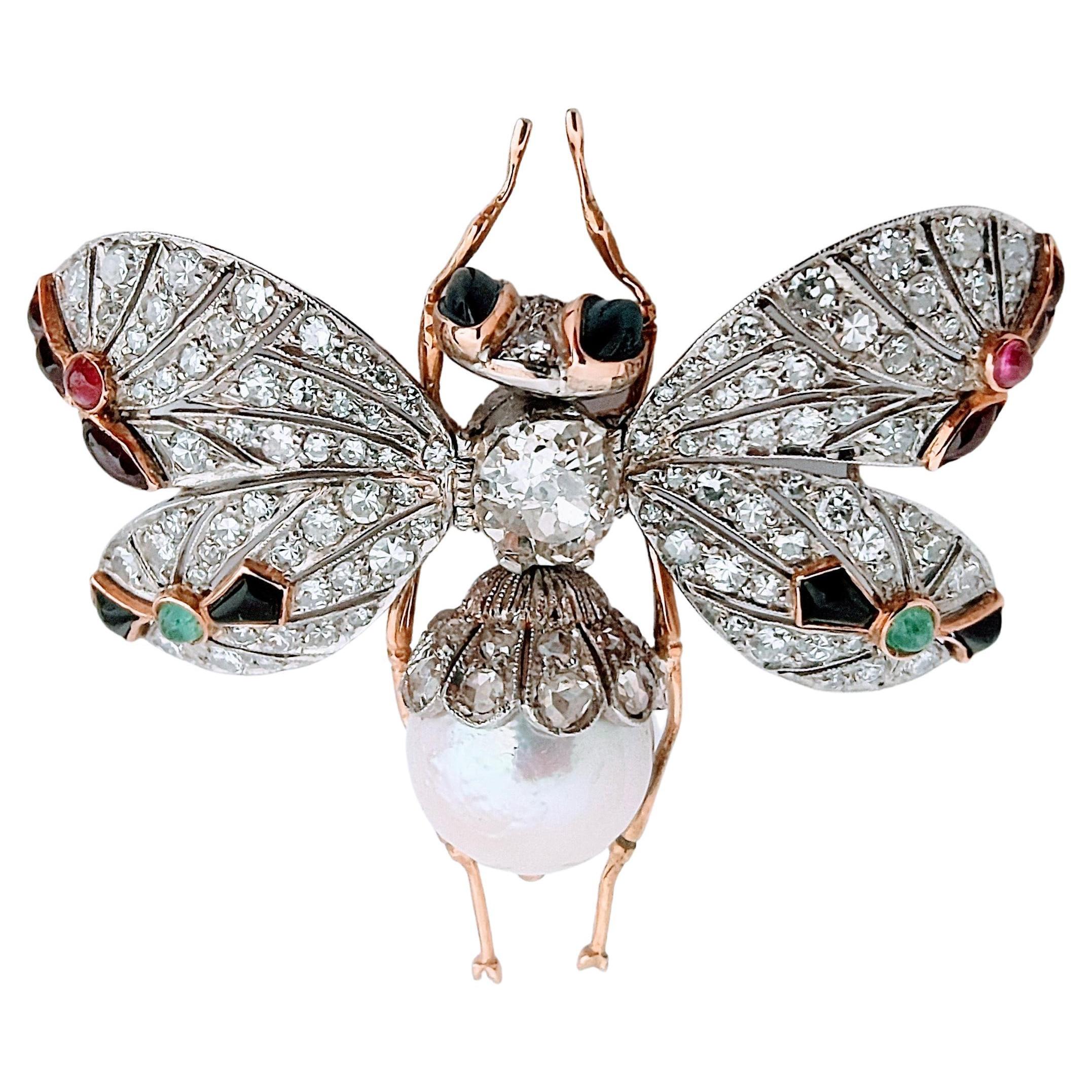 Beautiful butterfly with movement made of platinum and detail in gold 18 Karats, weight 23.29 grams. In the center set in illusion a beautiful Old Mine cut Diamond measures 8.30x 7.50x 5.60 millimeters and weight 2.02 carats, color K and clarity I1.