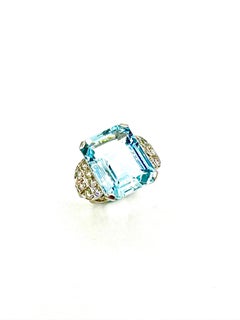 Retro 21.67 Carats Emerald Cut Aquamarine and Diamond Platinum Cocktail Ring