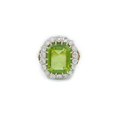 Retro 21 Carat Emerald Cut Peridot and 3cts Old European Cut Diamond Halo Ring