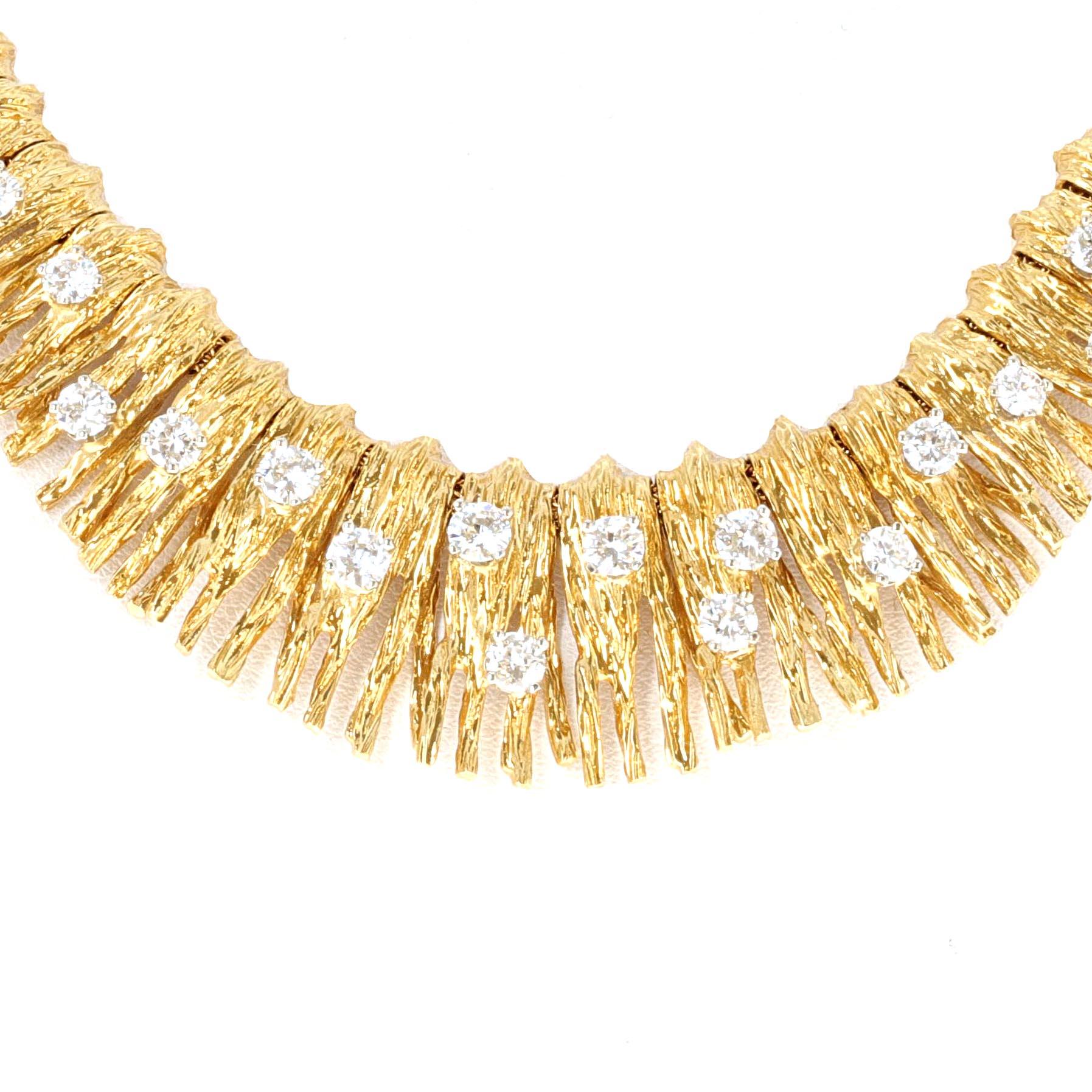 Retro, 18 karat yellow gold bark and diamond necklace. The necklace is made with beautiful detail and has an estimated 2.25 carats total weight in white, eye clean, round brilliant diamonds.
