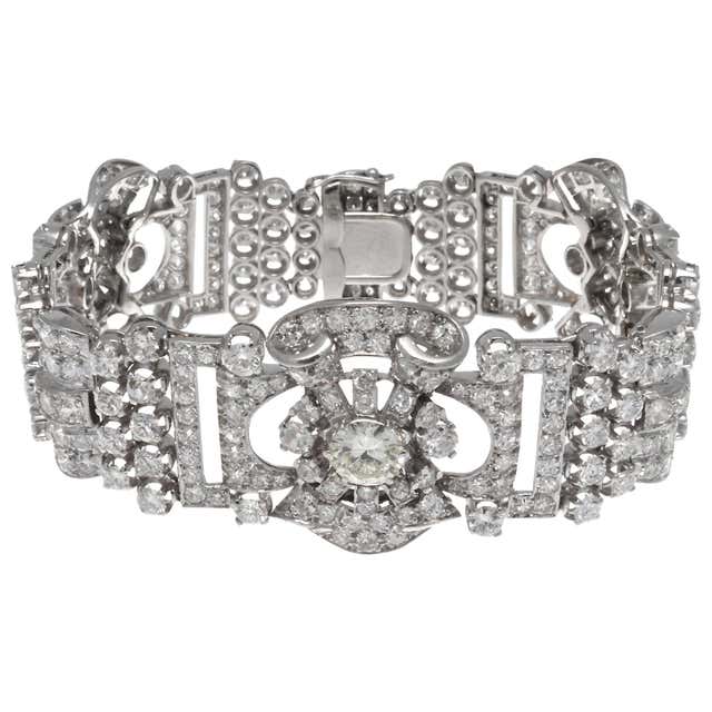 Retro Wide Emerald Cut and Round Diamond Platinum Bracelet For Sale at