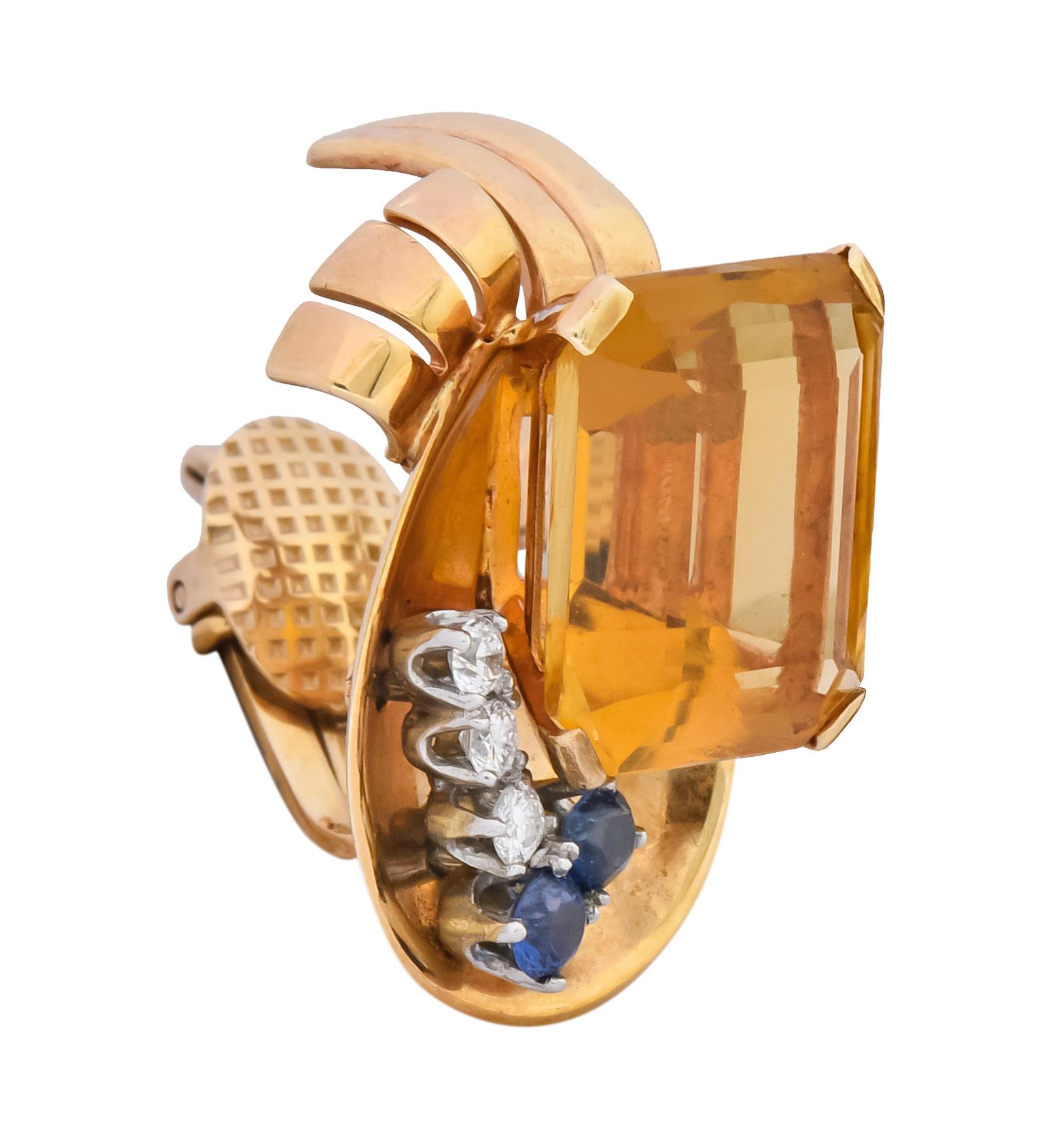 Each earring centers a rectangular step cut citrine weighing 28.48 total carats, transparent and honey colored

Accented by round brilliant cut diamonds and round cut sapphires weighing approximately 0.78 carat total, diamonds eye-clean/white and