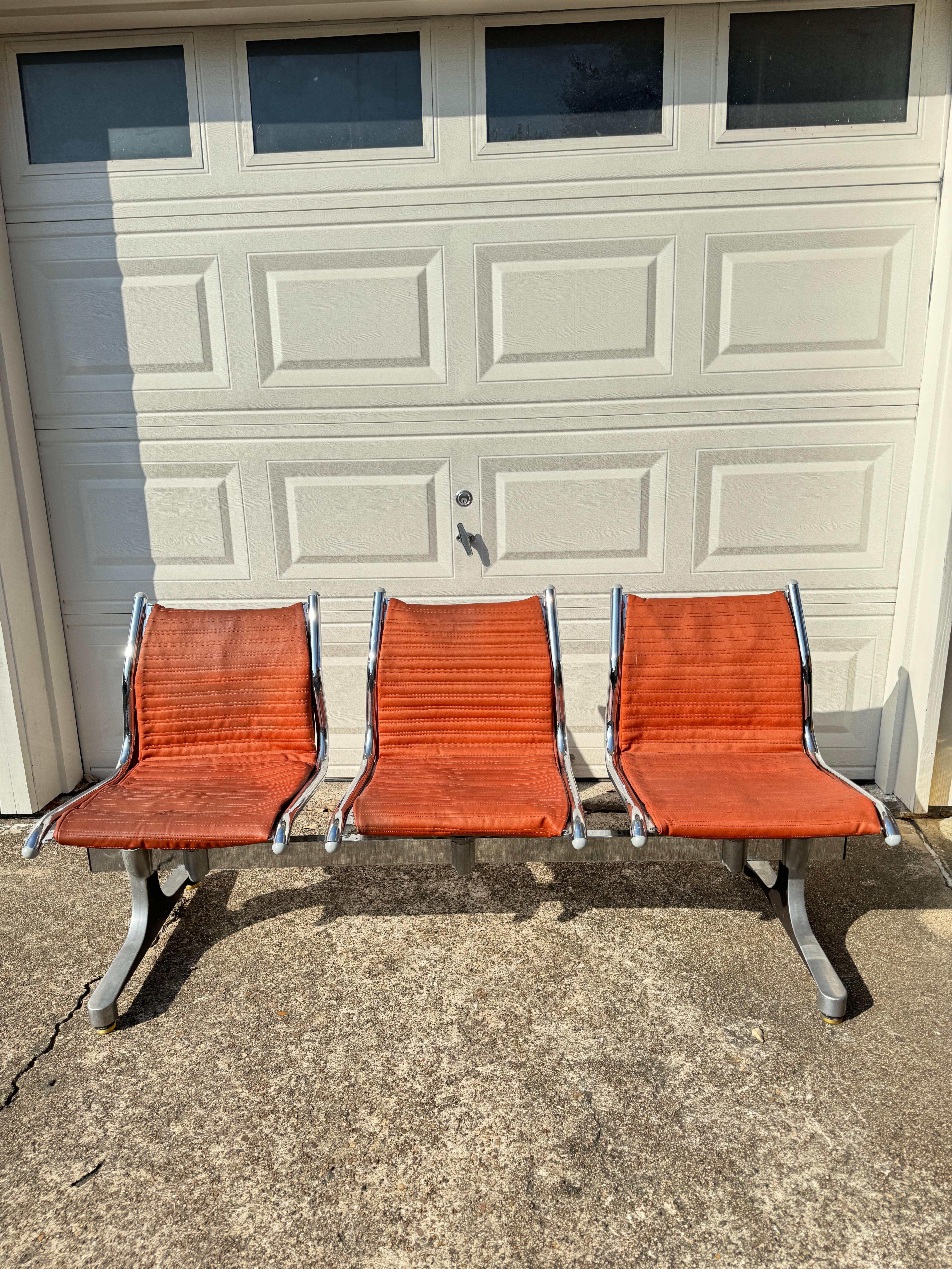 Retro 3 seater leather bench in the style of Herman Miller, circa 1970’s. Can be used for living room seating, or even porch seating. In good original condition and structurally sound. Seating has some minor discoloration but no rips or tears. 

65”