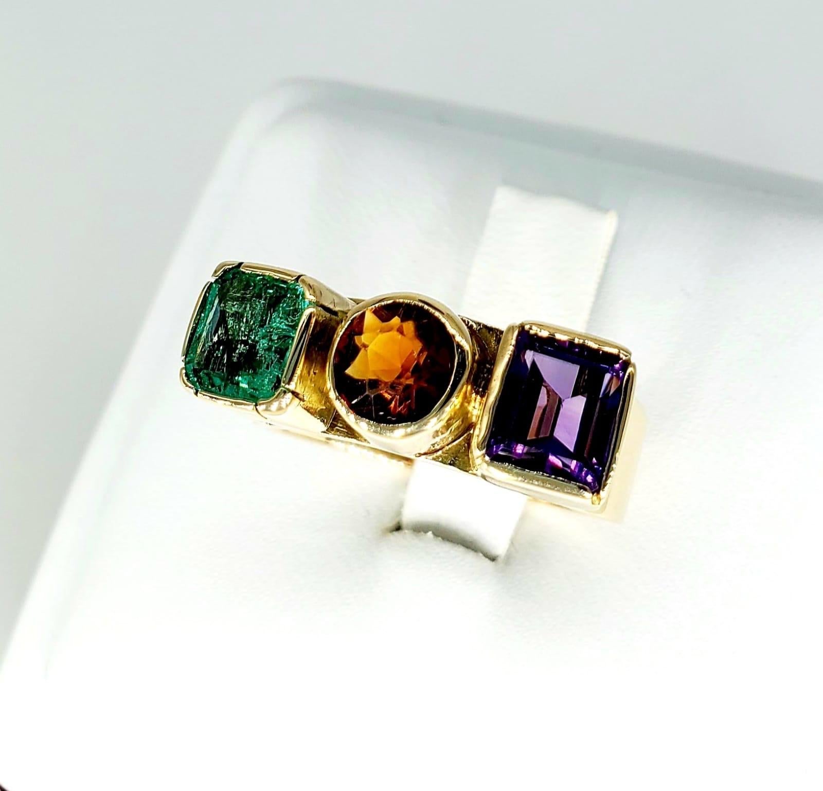 Retro 3.50 Carat Emerald, Amber & Amethyst Gemstone Ring. The ring is a retro art piece featuring a 1.25 carat Green Emerald, 1.25 carat Amethyst & 1 Carat Amber gemstone. The ring is very unique and a fashion/art statement ring. The ring is a size