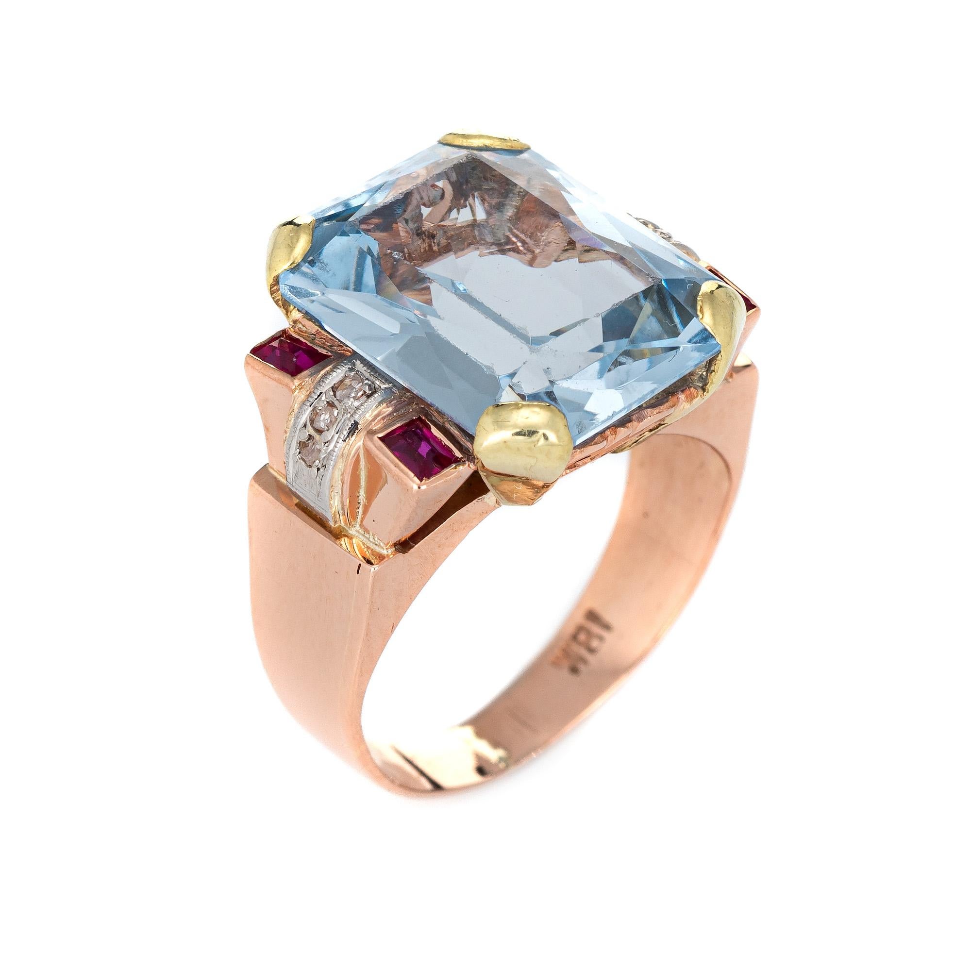 Stylish retro vintage blue topaz, ruby & diamond ring (circa 1940s) crafted in 18 karat rose gold. 

Blue topaz measures 14mm x 11mm (estimated at 10 carats), accented with four estimated 0.02 carat rubies (0.08 carats total estimated weight). Six