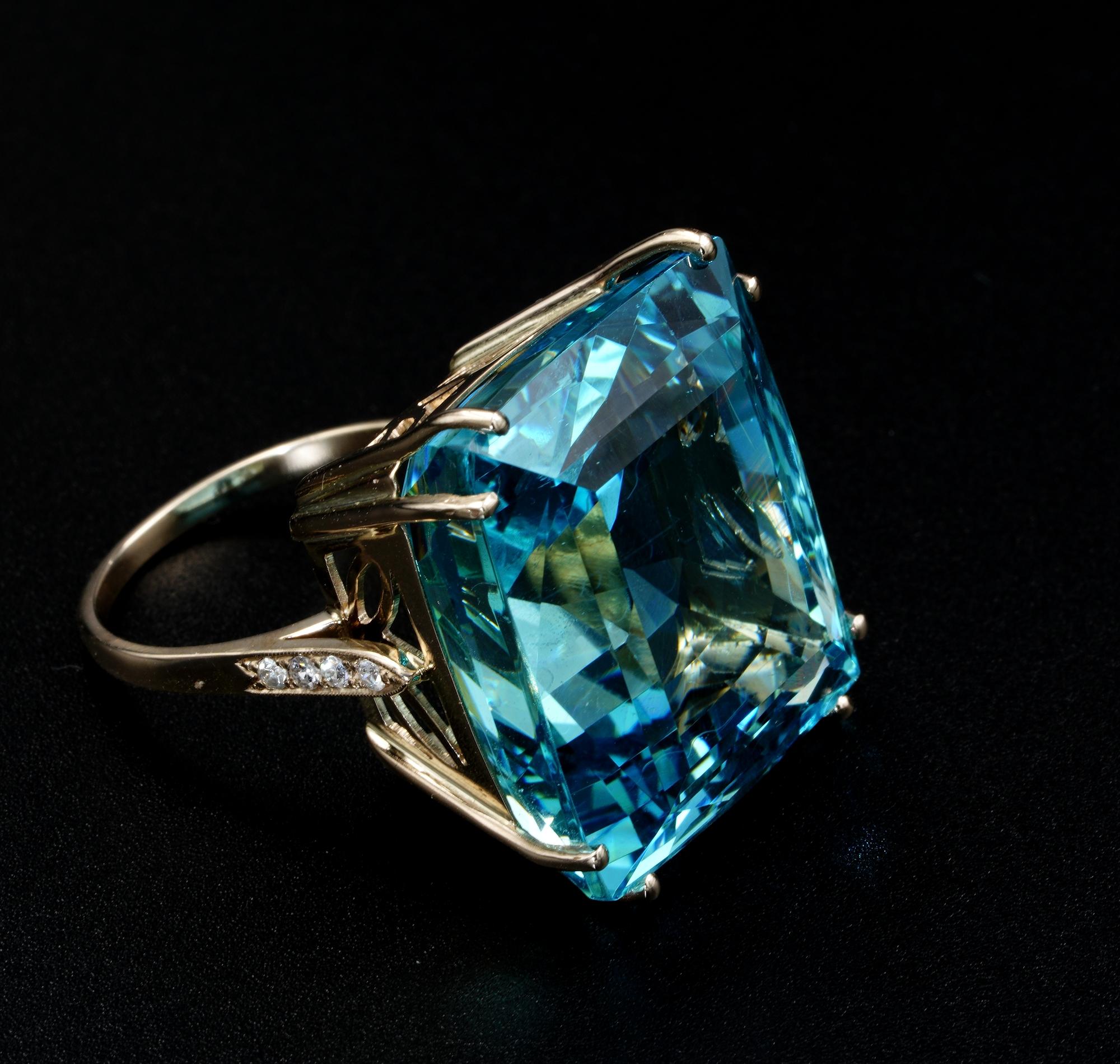 Classy Masterpiece
A magnificent Aquamarine statement ring
It features a central emerald cut, natural untreated Aquamarine weighing an impressive 50.00 carats which has a wonderful sky-blue hue with green overtone (22.53 x 19.54 mm.)
Flanking the