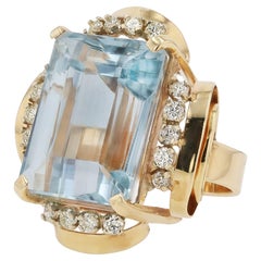 Anello cocktail monumentale retrò con acquamarina e diamanti da 55 carati