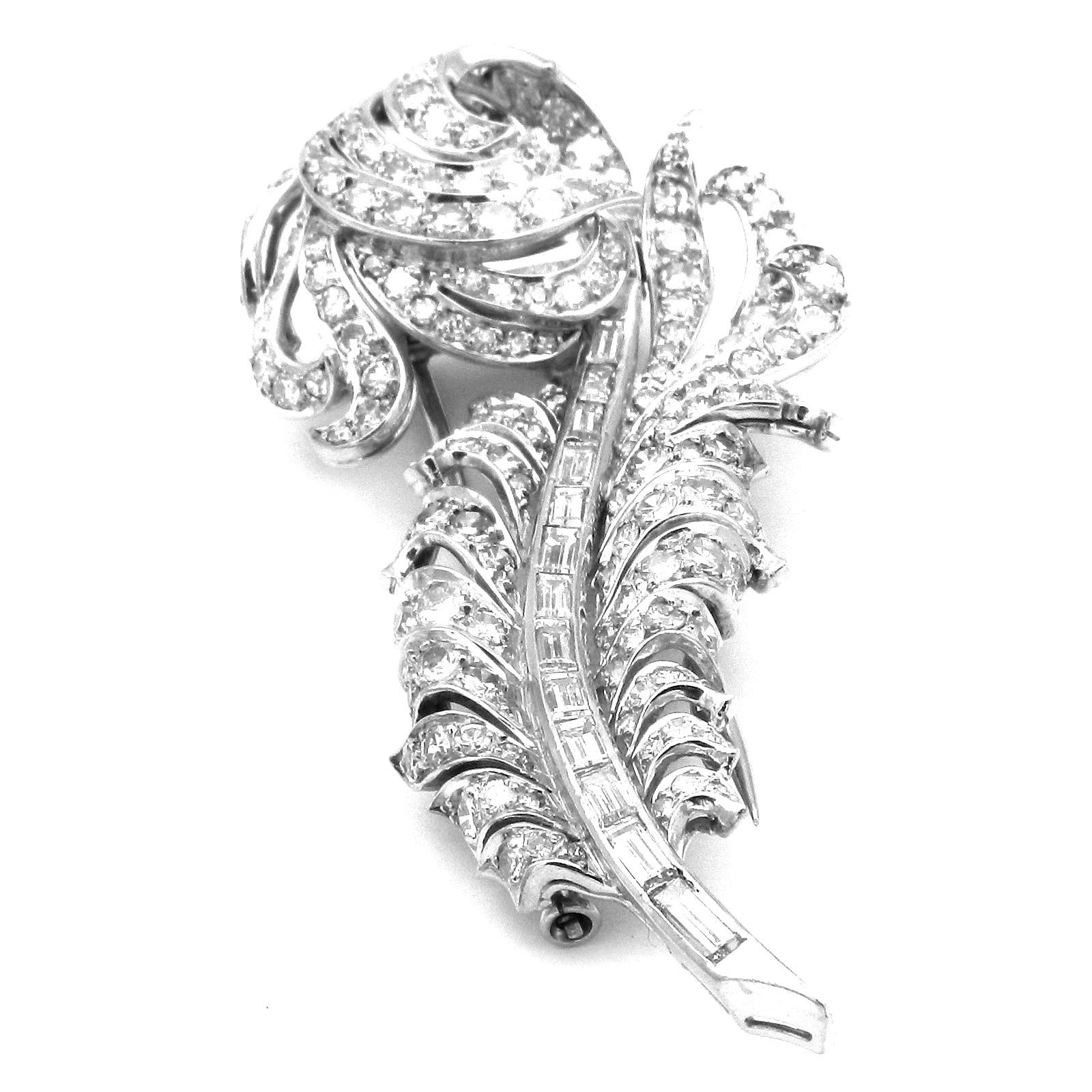 Retro 6 ct Diamond Feather Platinum Clip Brooch circa 1940

Very decorative diamond clip brooch of impressive size, in the shape of a magnificent feather, set with 178 radiant diamonds totaling 5.95 ct. The quill pen is accentuated with baguette