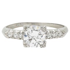 Vintage .68 CTW Transitional Cut Diamond Platinum Fishtail Vintage Engagement Ring