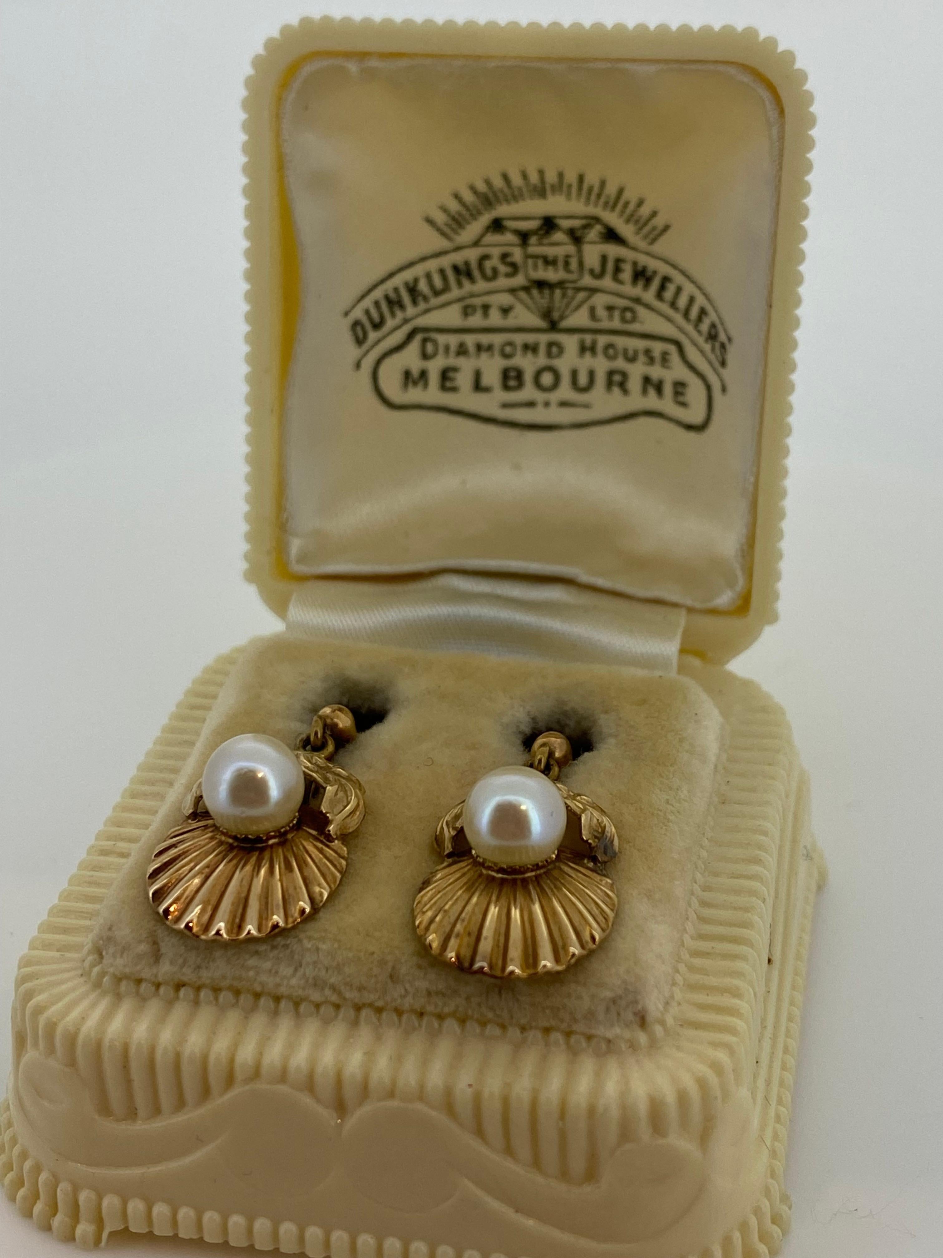 These Retro Clip on Earrings were retailed by Dunklings –

Renowned Melbourne jeweller – 

 

Meticulously crafted in 9K Rose Gold, 

this pair is retro, dating from 1950’s

 

Each designed as a shell centering a Pearl – 

of good colour & luster,