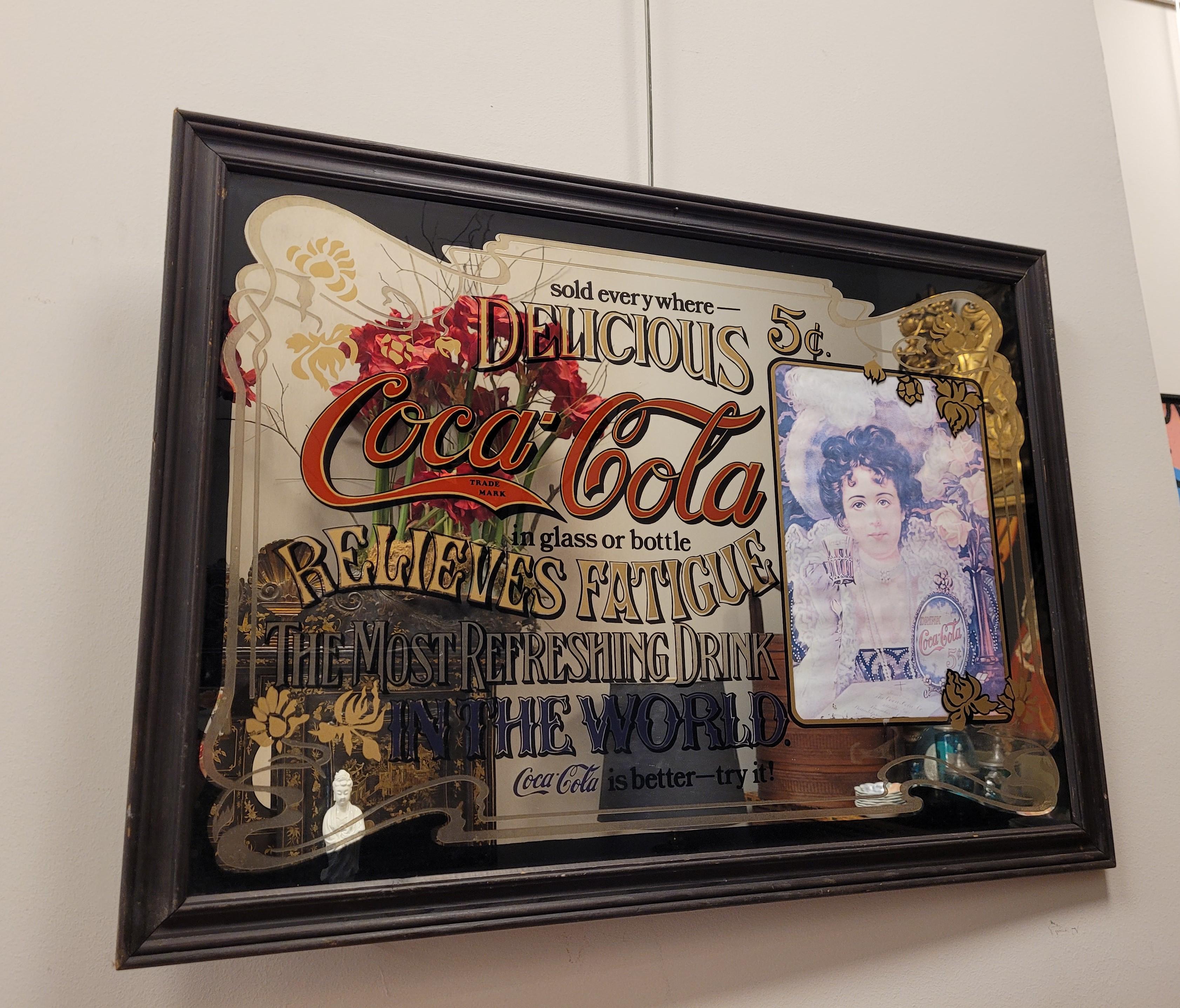 A silk-screened mirror painting of Coca-Cola. With a retro advertising style from the 1920s. The advertising of the time said 
