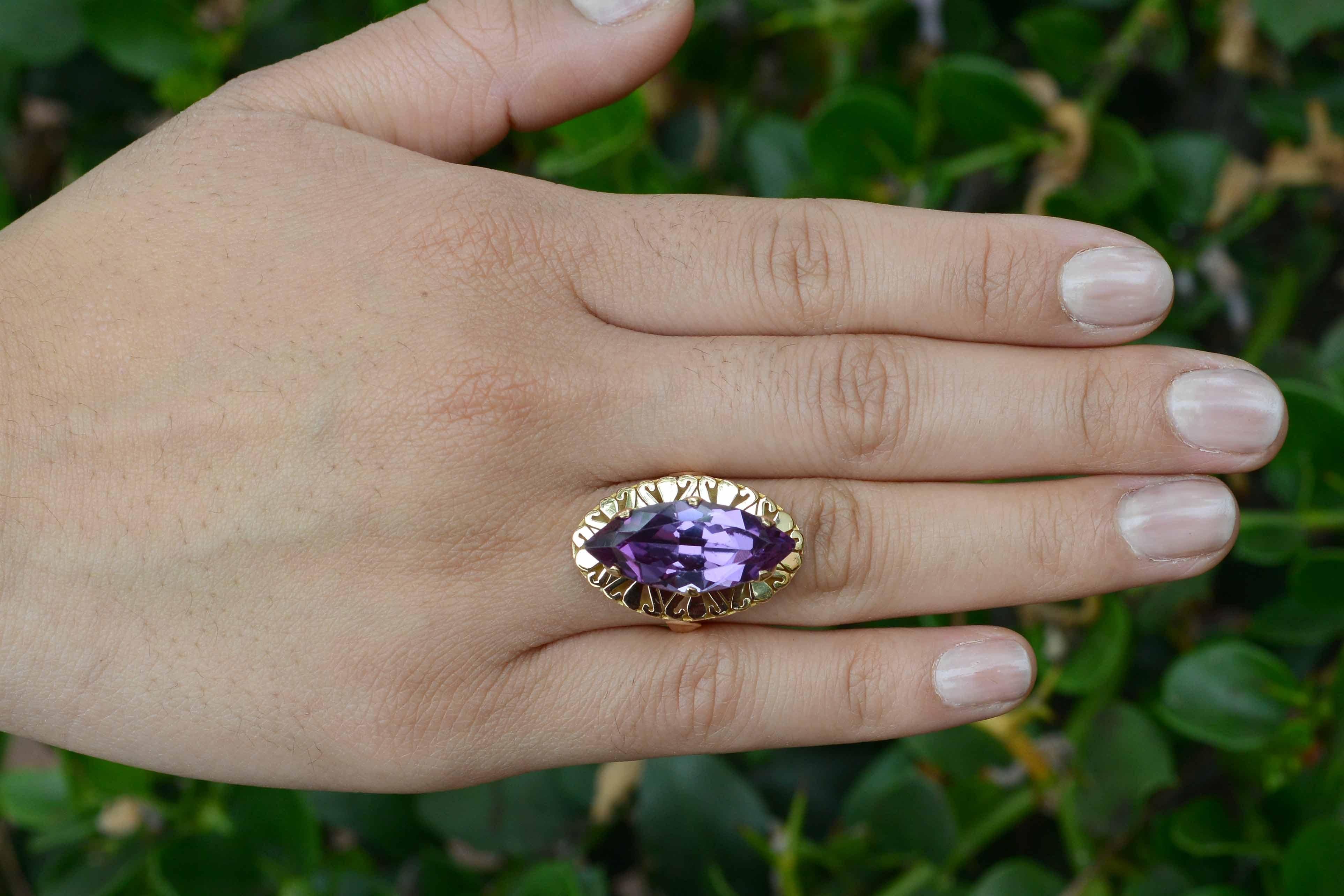 The Greeley long cocktail ring. Vintage 1940s Retro era estate jewelry statement pieces are so hot right now. You will love to rock this huge, 8.34 carat marquise synthetic color change sapphire. With awesome finger coverage and a rich, royal purple