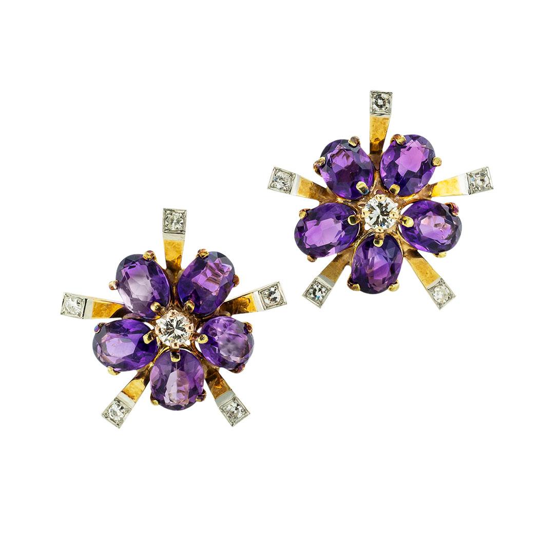 Retro amethyst and diamond yellow gold earrings circa 1950.  *

ABOUT THIS ITEM:  #E-DJ21H. Scroll down for specifications.  These flower-shaped amethyst and diamond earrings are set with stones that display a rich royal purple color that is so much