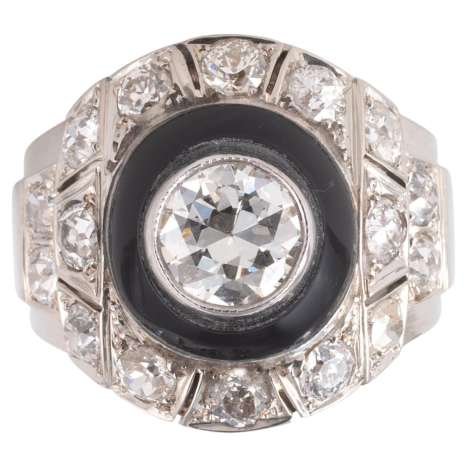 Retro An Onyx And Diamond Cluster Ring