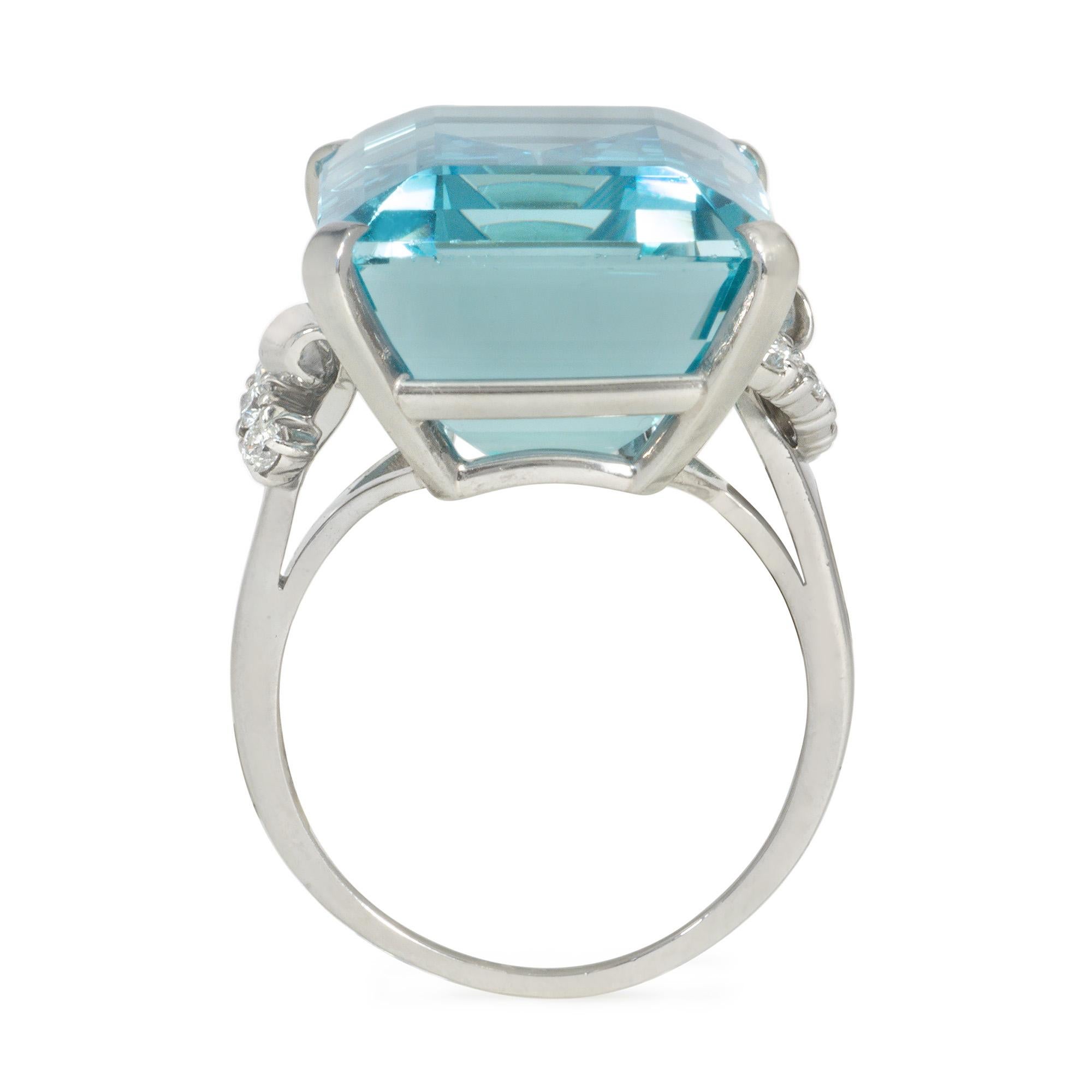 Emerald Cut Retro Aquamarine, Diamond, and Platinum Cocktail Ring with Scrolled Shoulders For Sale