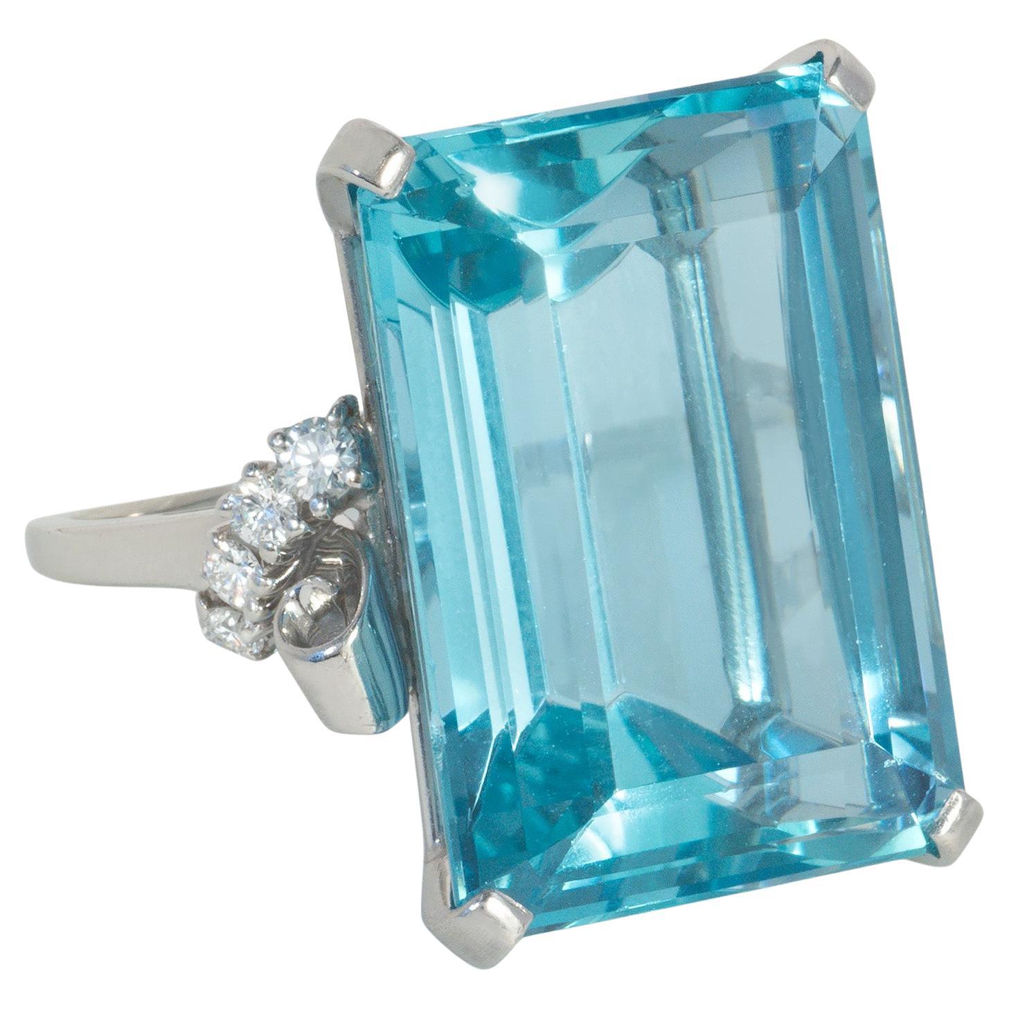 Retro Aquamarine, Diamond, and Platinum Cocktail Ring with Scrolled Shoulders