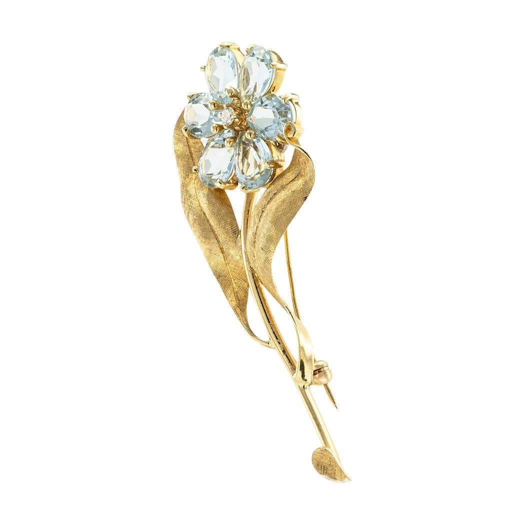 Retro aquamarine and diamond single-stem flower brooch circa 1950. *

ABOUT THIS ITEM:  #P-DJ912C. Scroll down for detailed specifications.  The single stem flower brooch is formed by pear-shaped blue aquamarine centered by a single round diamond. 