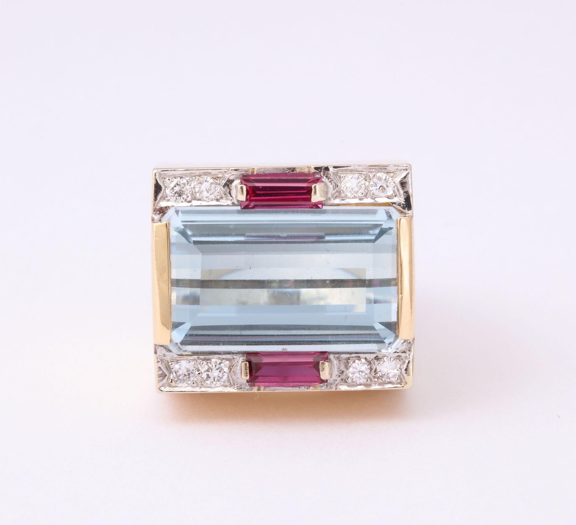 A stunning Retro ring with diamonds and spinels surround (easily removed) set in 18k gold.
 