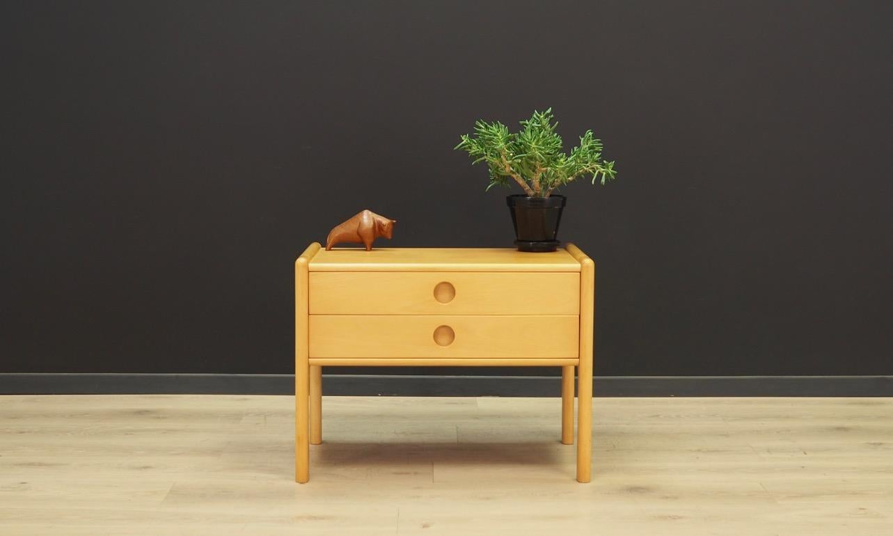 Minimalist chest of drawers from the 1960s-1970s, Classic Danish form. The whole veneered with ash. Two utility drawers. Preserved in good condition (minor scratches) - directly for use.

Dimensions: height 49 cm, width 65.5 cm, depth 40 cm.