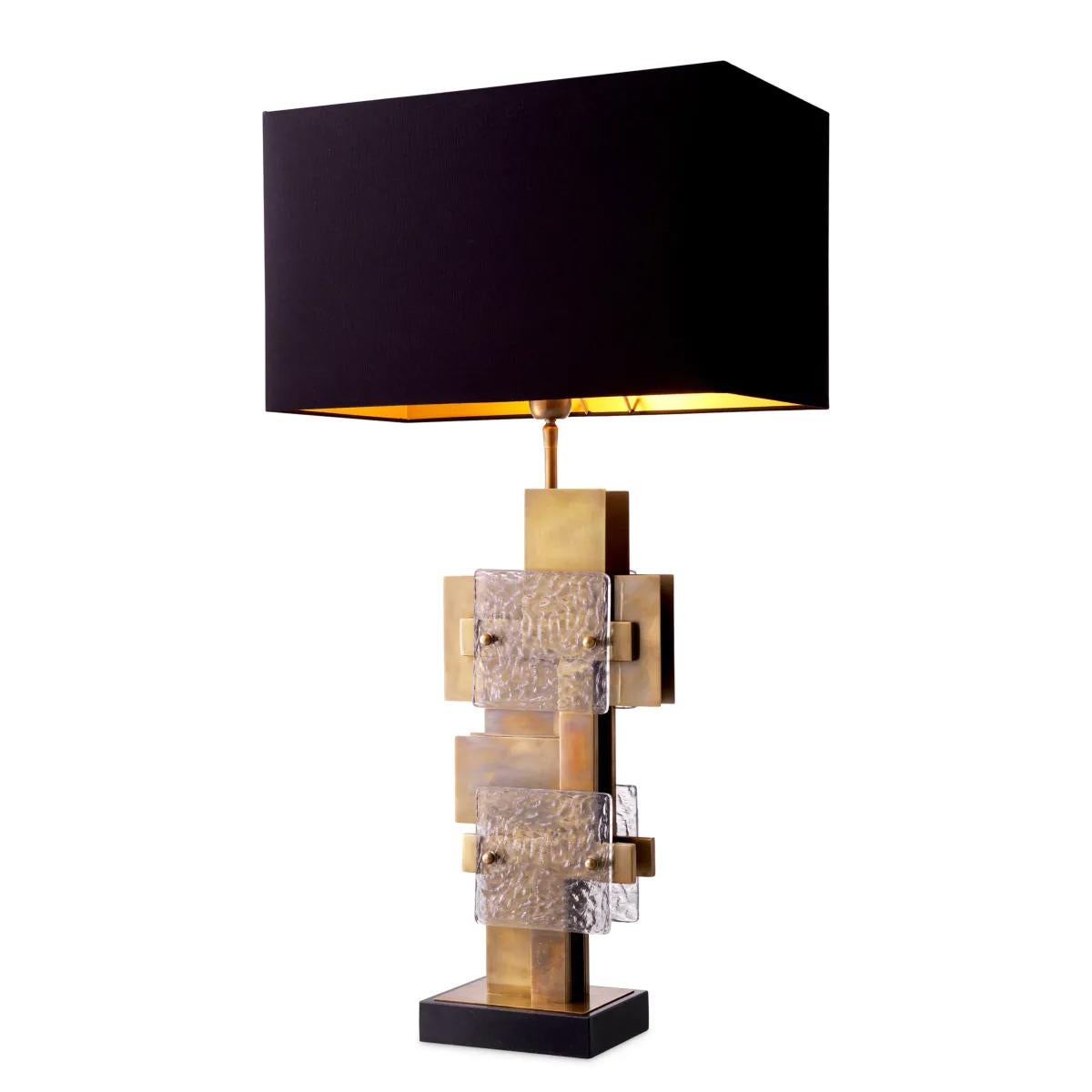 Table Lamp Retro Barnes with structure in solid brass in antique
finish, with frosted clear glass plates, with black granite base. With
1 black cotton shade included. Lamp holder type E27, max 40 watt,
1 bulb, bulb not included.