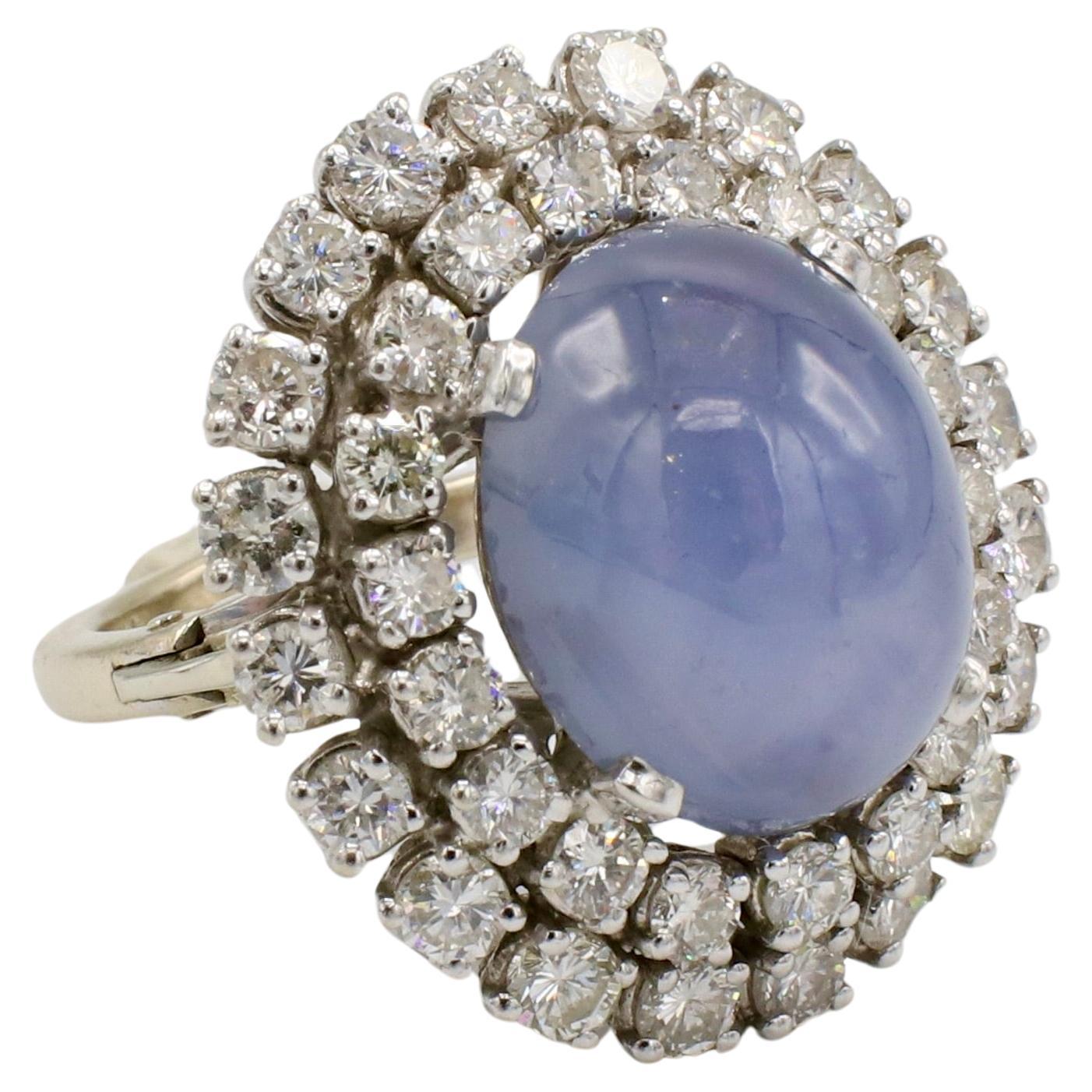 Retro Blue Star Sapphire & Natural Diamond Double Halo Cocktail Dome Ring 
Metal: 14k white gold
Weight: 12.55 grams
Sapphire: 15 x 12.5 cabochon, approx .17 carats 
Diamonds: Approx. 3.5 CTW G-H VS round natural diamonds
Top: 25 x 22.5mm
Height: