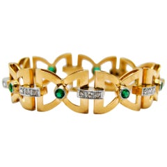 Art Deco Bow-Tie Link Bracelet in 18 Karat Yellow Gold with Emerald and Diamonds