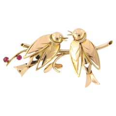 Vintage Brooch set with ruby and diamonds 18k pink gold