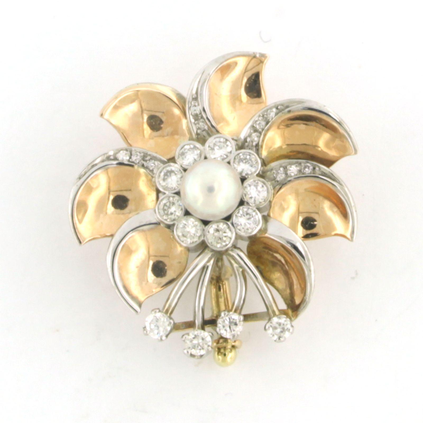 14k bicolor gold brooch set with pearl and brilliant cut diamonds. 0.48ct - F/G - VS/SI

detailed description:

The size of the brooch is 2.6 cm by 2.5 cm wide

Weight 6.0 grams

Occupied with

- 1 x 5.0 mm freshwater cultured pearl

colour