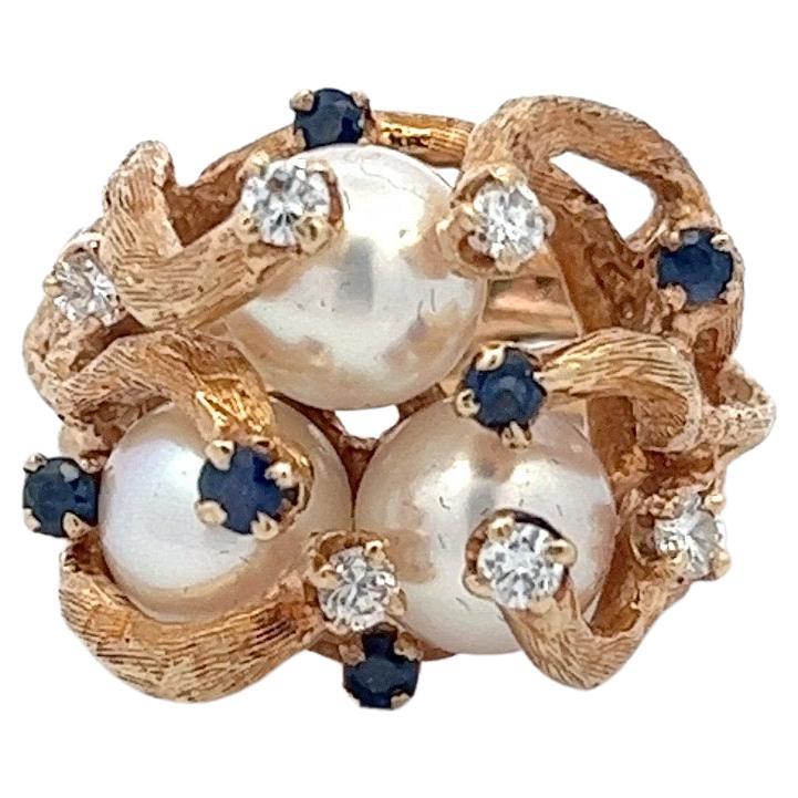 Retro Brutalist 14 Karat Gold Triple Pearl, Diamond, and Sapphire Cocktail Ring For Sale
