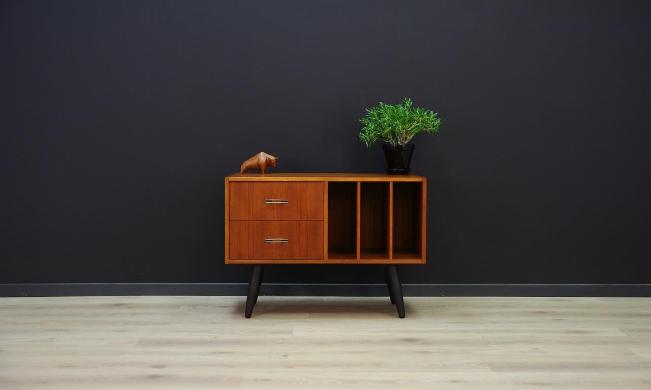 Original 1960s-1970s cabinet, minimalist Danish design. Form veneered with teak. Cabinet has two practical drawers and three compartments. Preserved in good condition (small bruises and scratches) - directly for use.

Dimensions: Height 59 cm,
