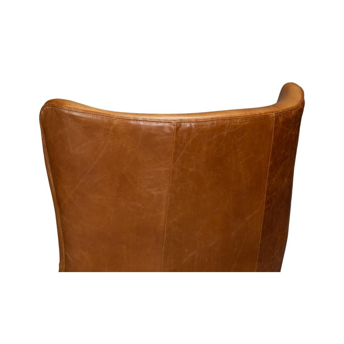 Contemporary Retro Caramel Leather Wingback Chair For Sale