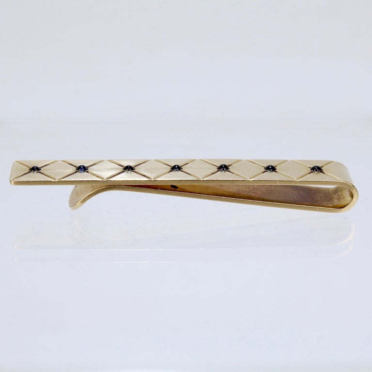 Retro Cartier 14 Karat Gold and Sapphire Men's Tie Clip at 1stDibs