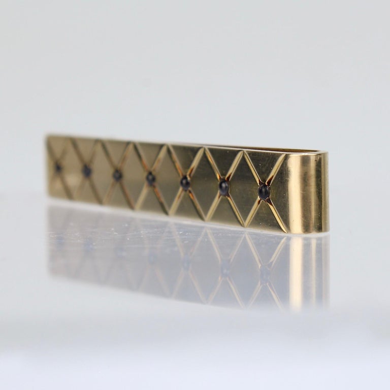 Retro Cartier 14 Karat Gold and Sapphire Men's Tie Clip at 1stDibs