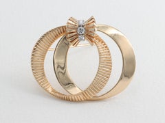 Cartier Mid Century Yellow Gold and Diamond Circular Brooch