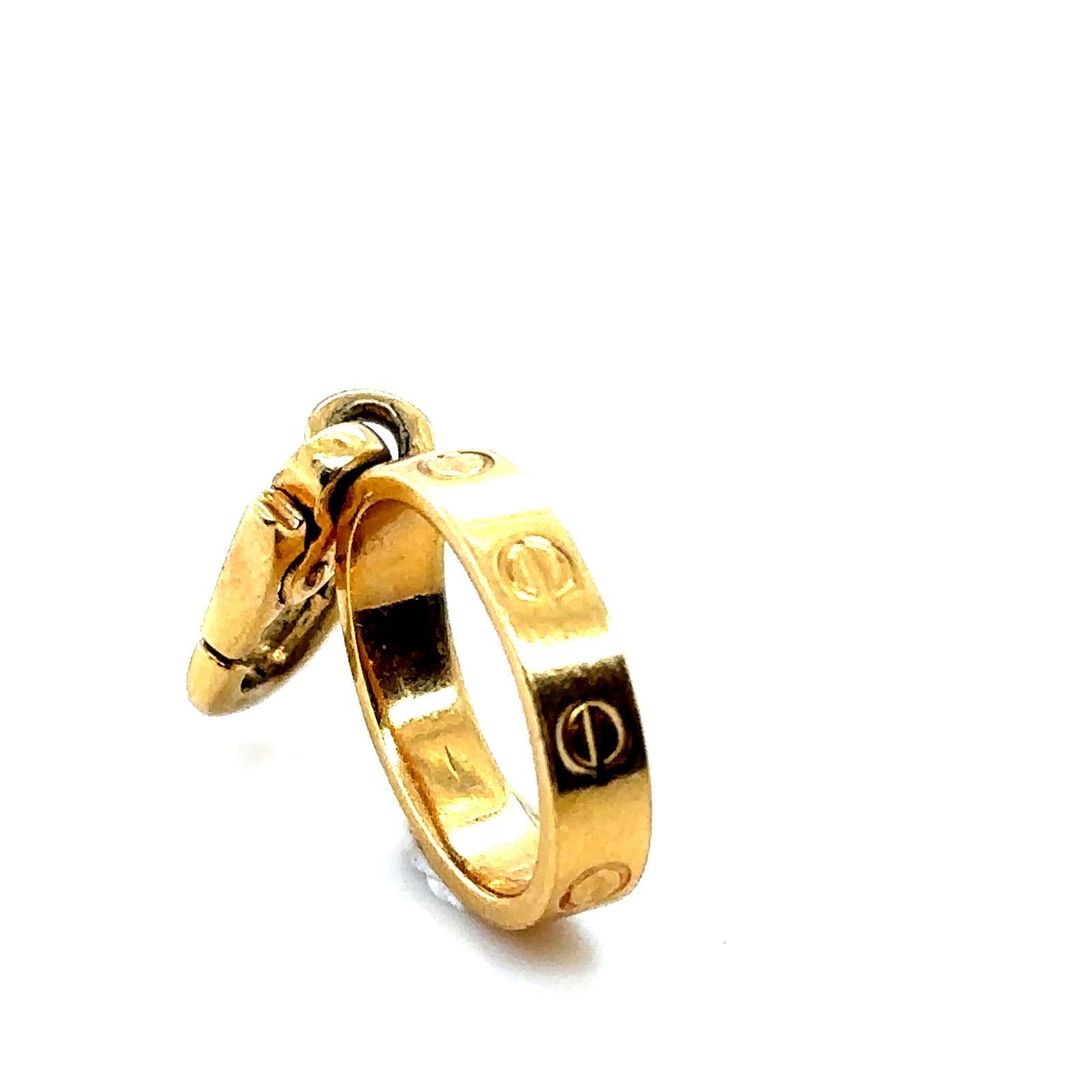 Rétro Bracciale dell'amore Cartier retrò con charme in oro giallo 18 carati in vendita