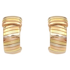 Cartier, boucles d'oreilles rétro Tubogas à trois anneaux en or 18 carats