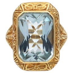 Retro Carved 18kt Yellow Gold and 12.00ct Aquamarine Ring