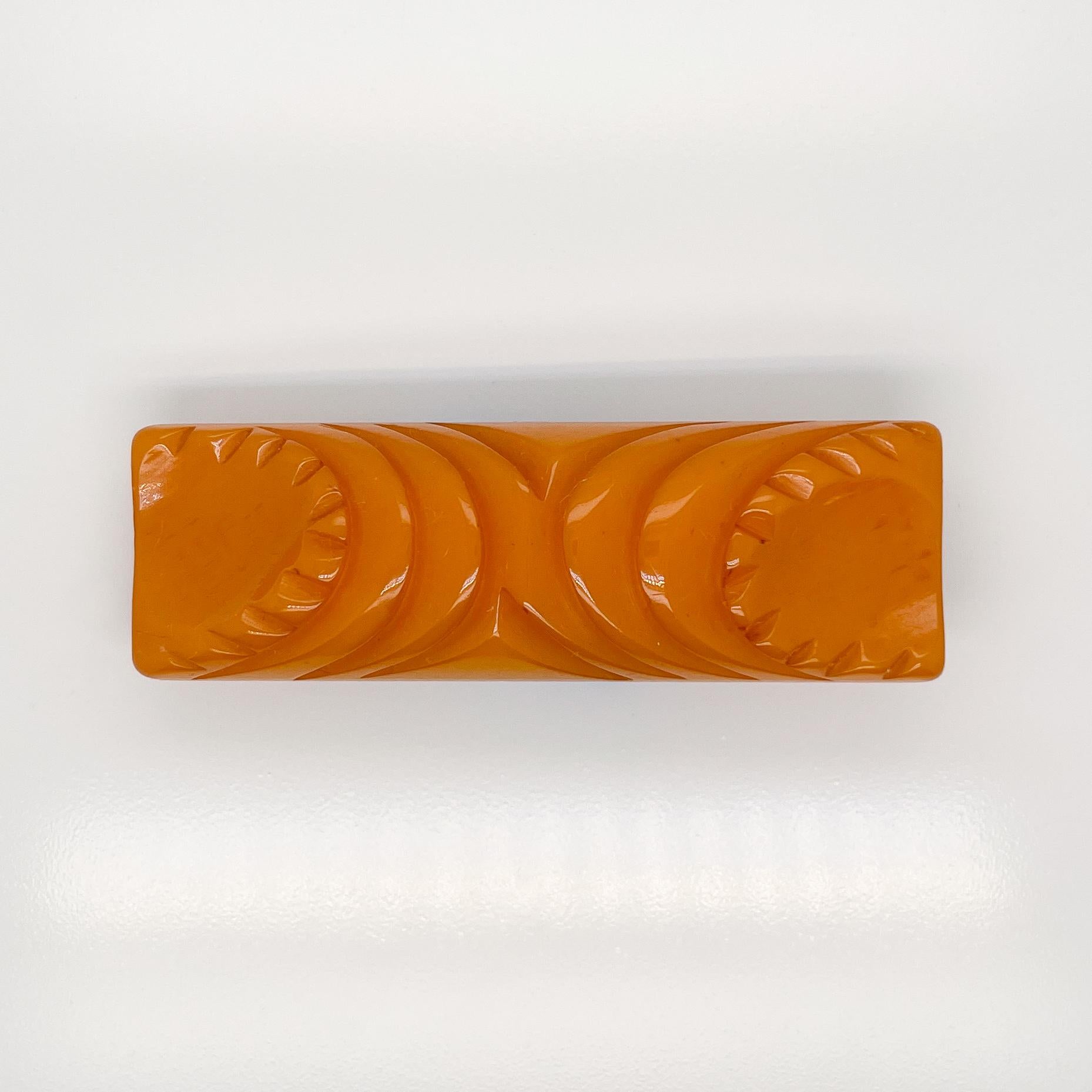 bakelite brooches