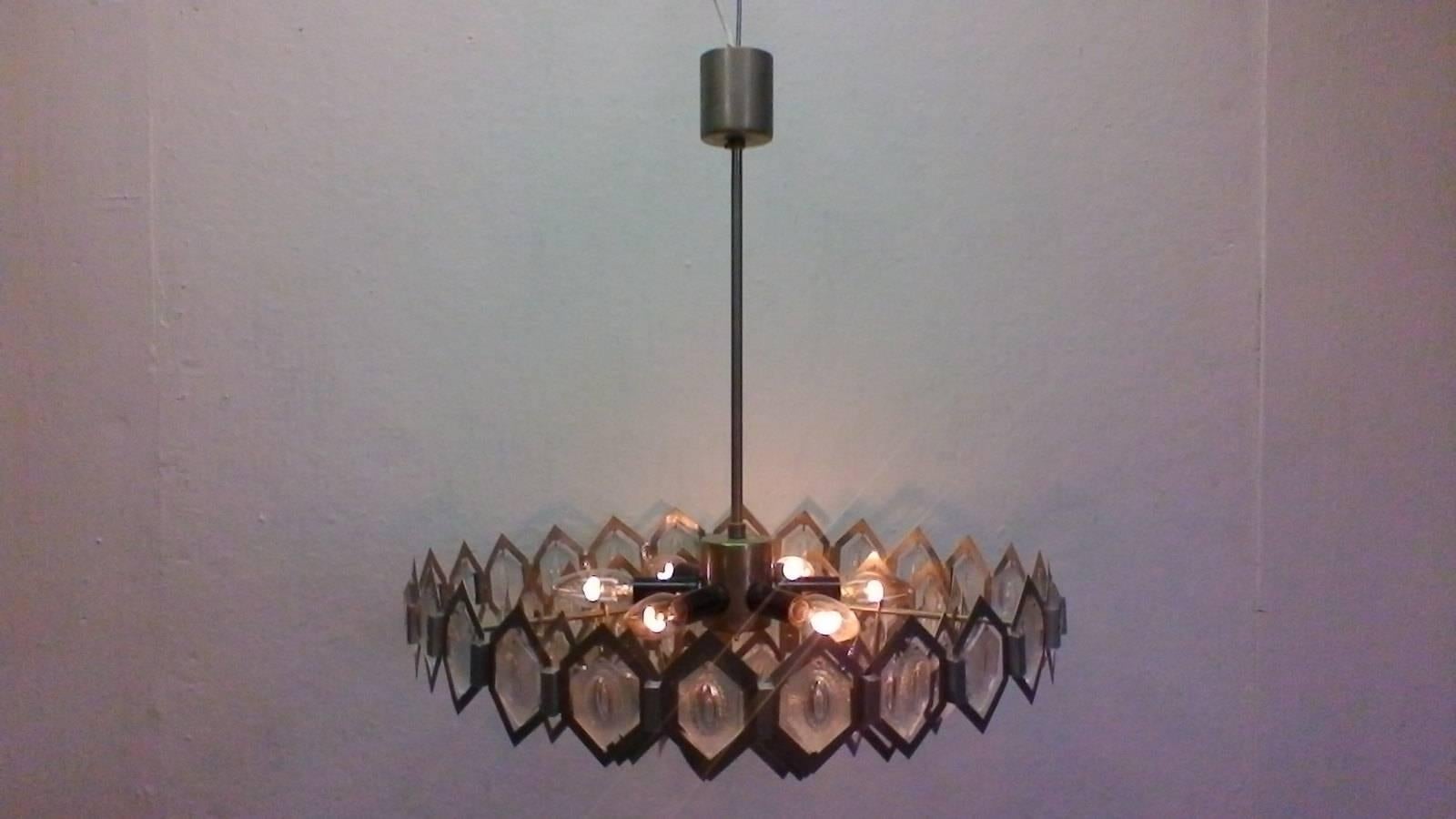 Czech designer Jaroslav Bejvl. The item is made of a combination of glass and metal and has six bulbs. The original preserved and functional condition. Very beautiful light style.